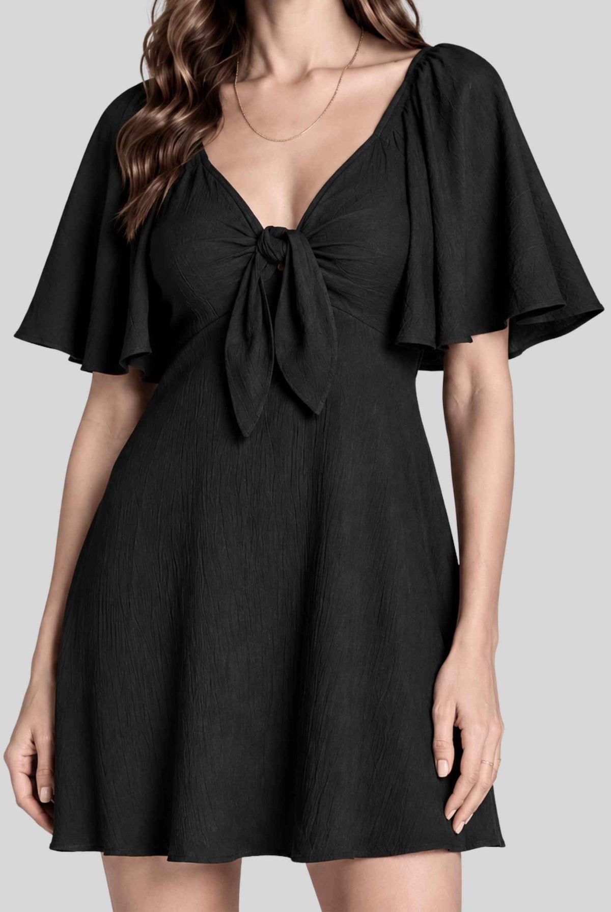 Virtual model wearing The Melody Flutter Sleeve Mini Tie-Front Flutter-Sleeve Mini Dress in Black