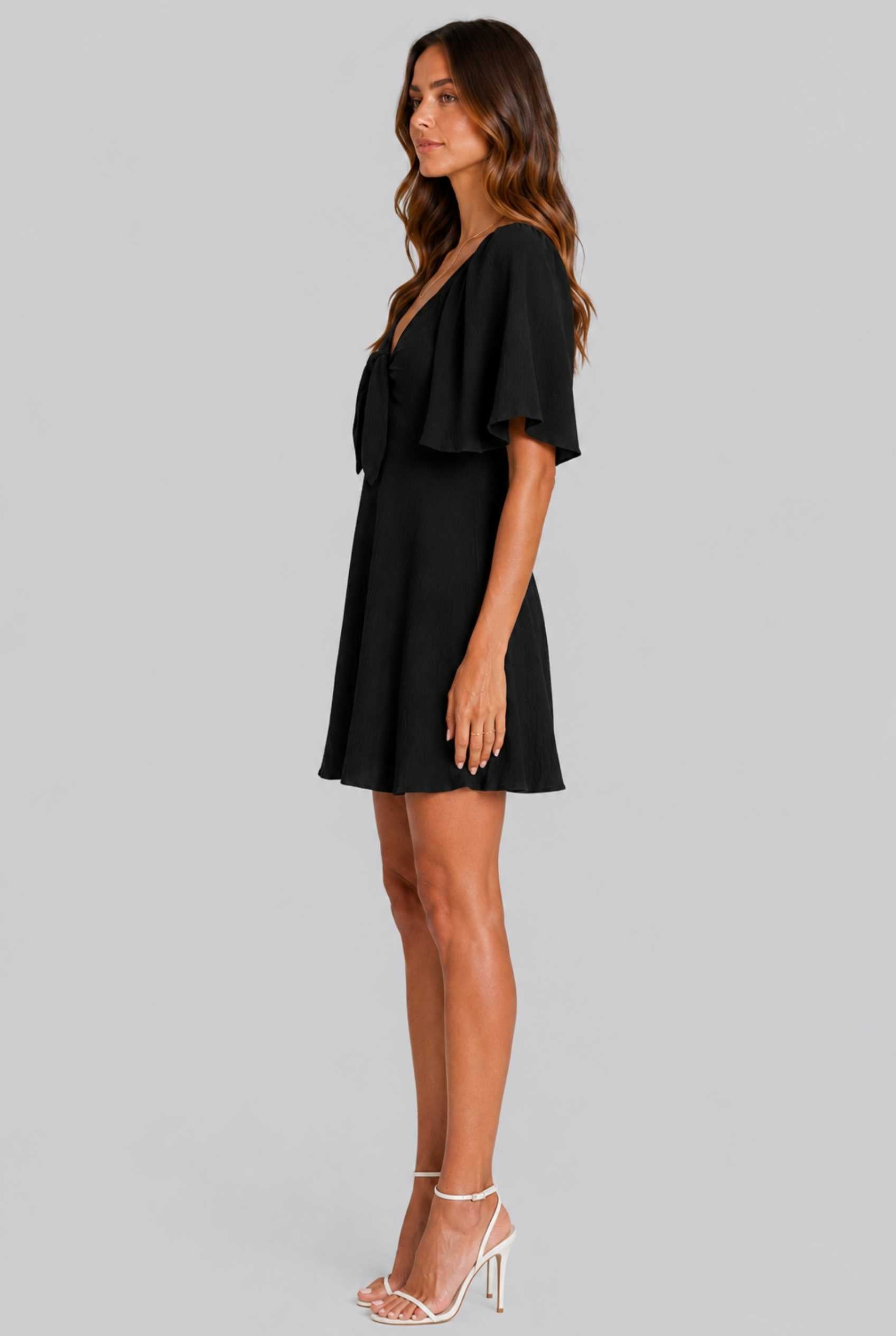 Virtual Model wearing The Melody Flutter Sleeve Mini Tie-Front Flutter-Sleeve Black Mini Dress
