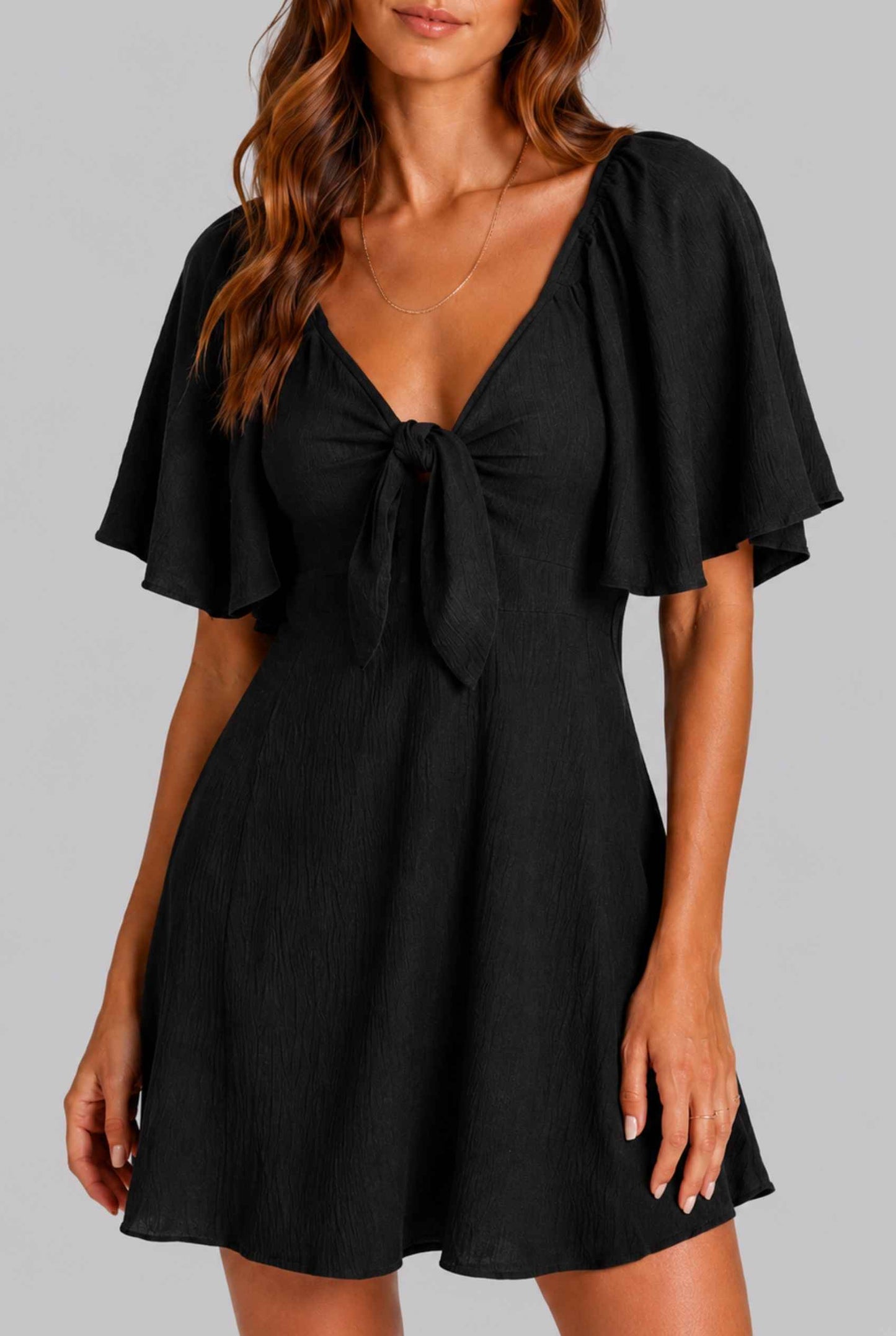 Virtual Model wearing The Melody Flutter Sleeve Mini Tie-Front Flutter-Sleeve Black Mini Dress
