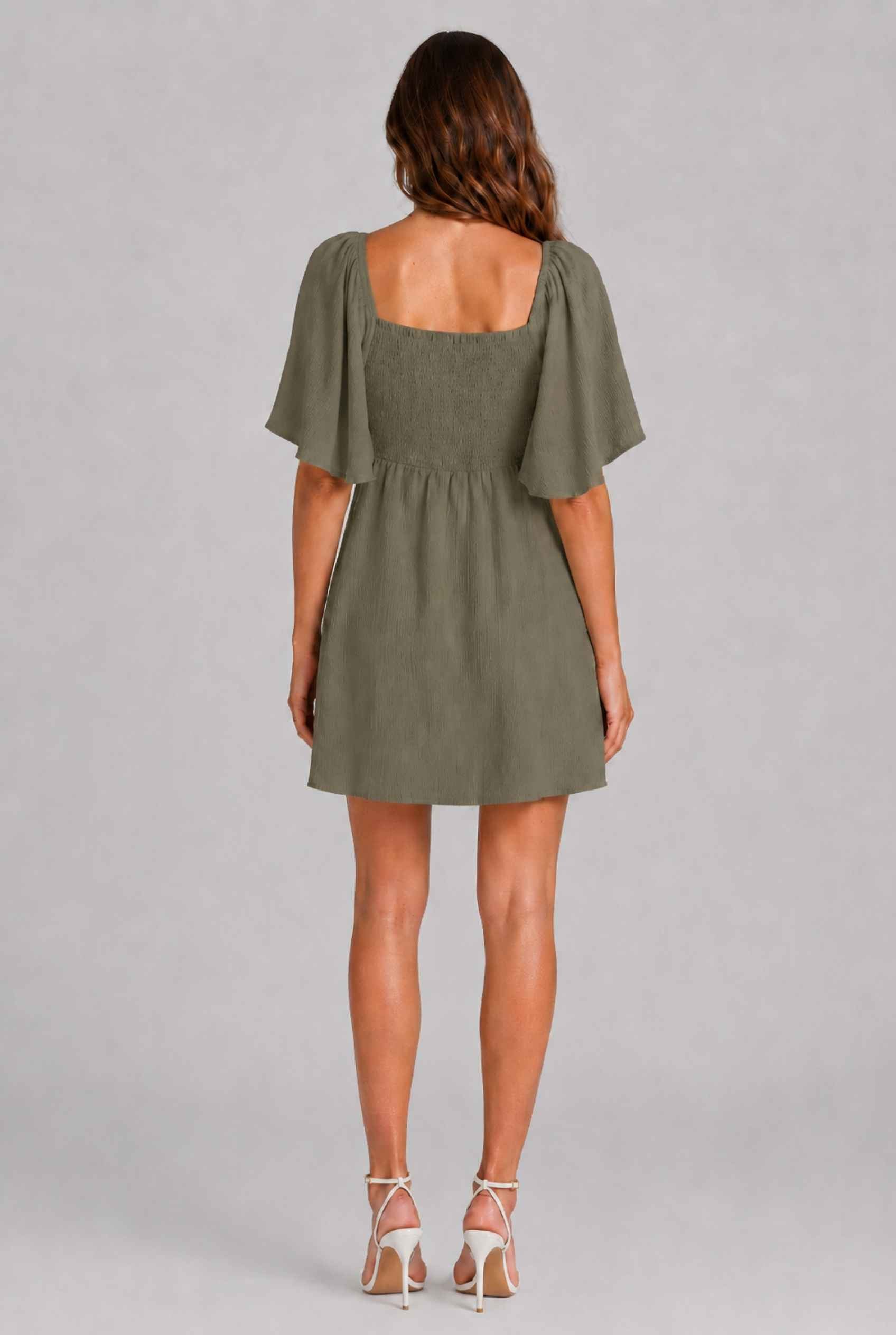 Virtual Model wearing The Melody Flutter Sleeve Mini Tie-Front Flutter-Sleeve Dark Green Mini Dress