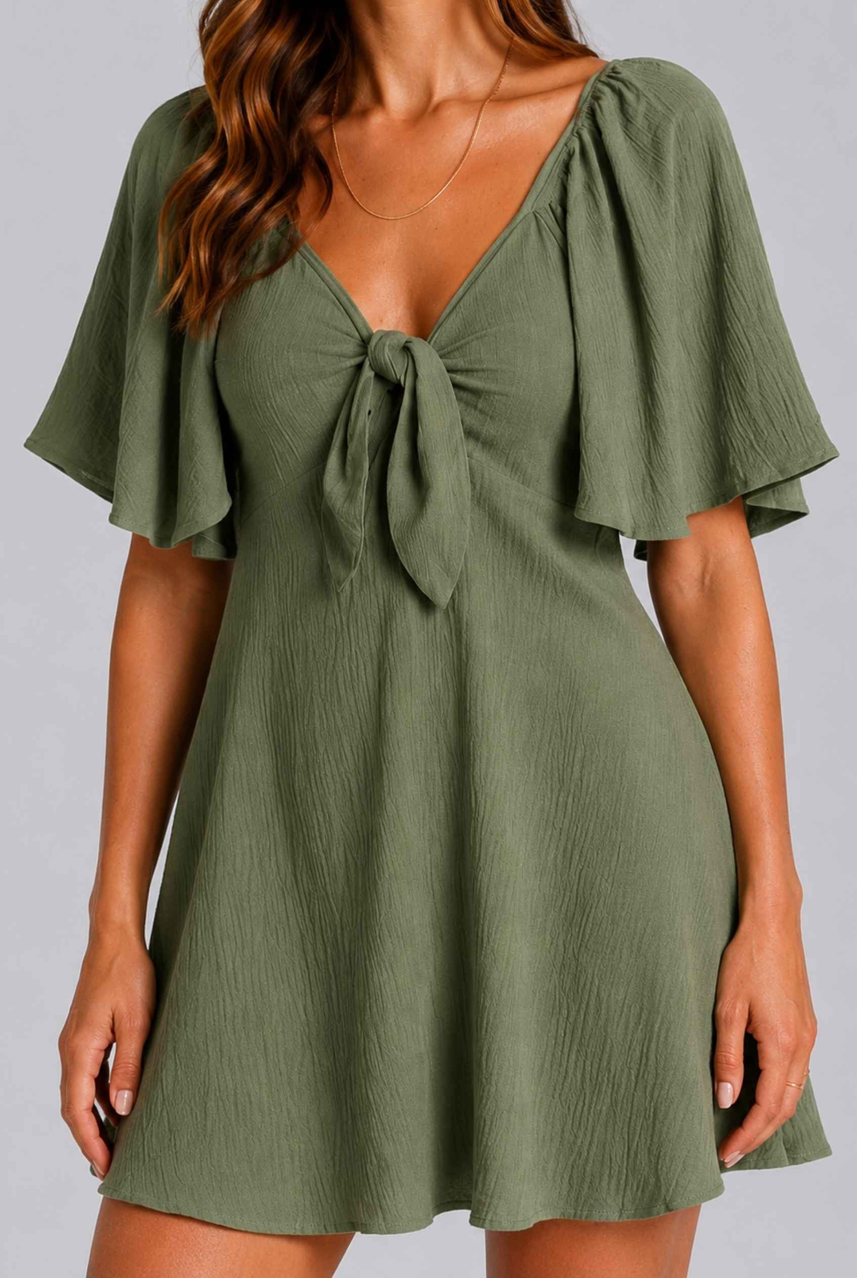 Virtual Model wearing The Melody Flutter Sleeve Mini Tie-Front Flutter-Sleeve Dark Green Mini Dress