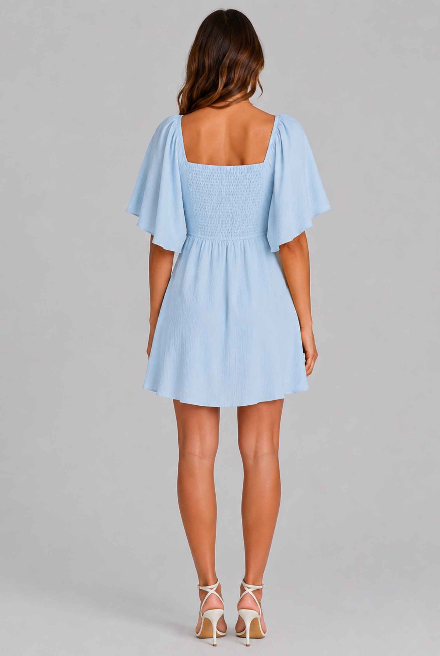 Virtual Model wearing The Melody Flutter Sleeve Mini Tie-Front Flutter-Sleeve Light Blue Mini Dress