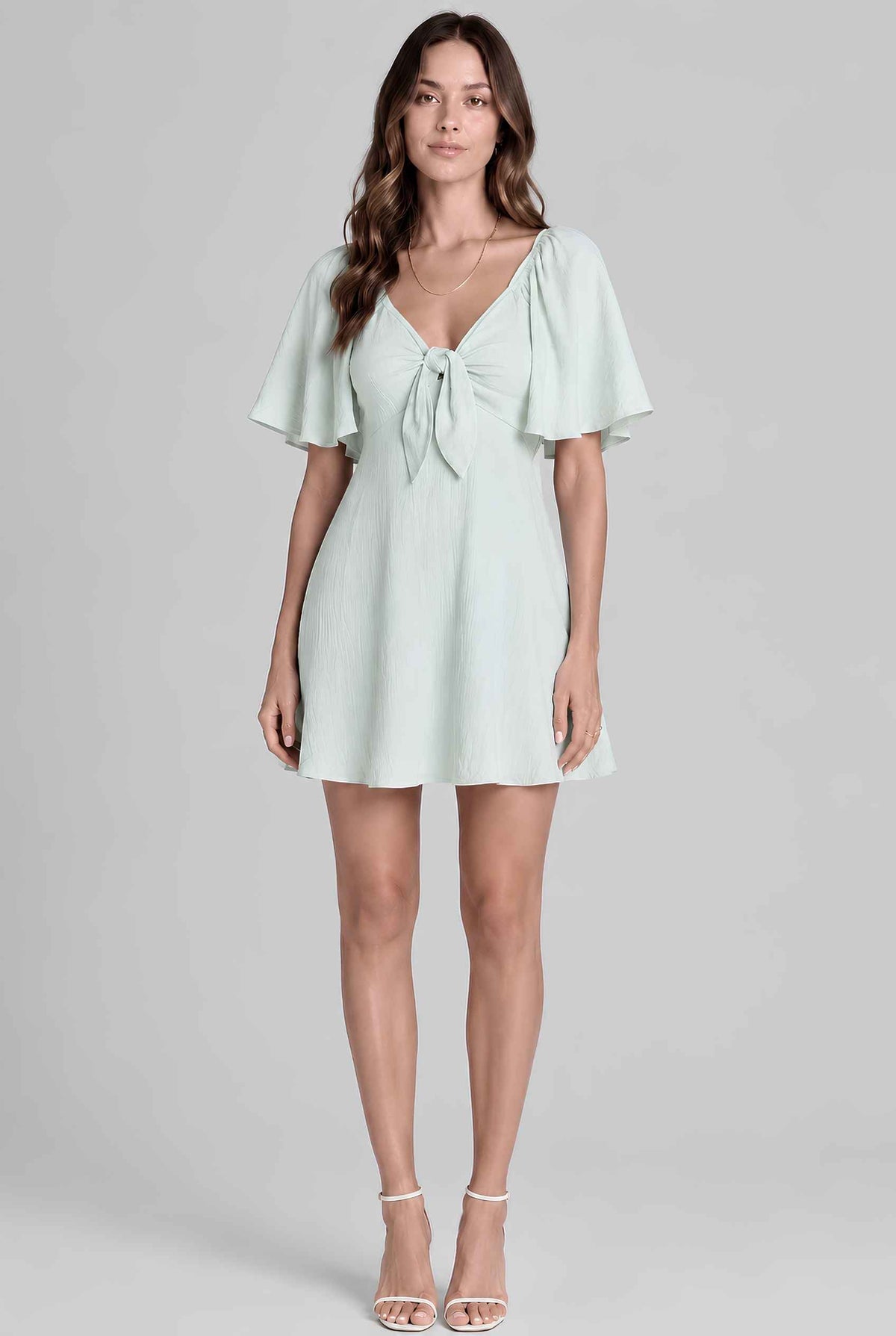 Virtual model wearing The Melody Flutter Sleeve Mini Tie-Front Flutter-Sleeve Mini Dress in Light Green