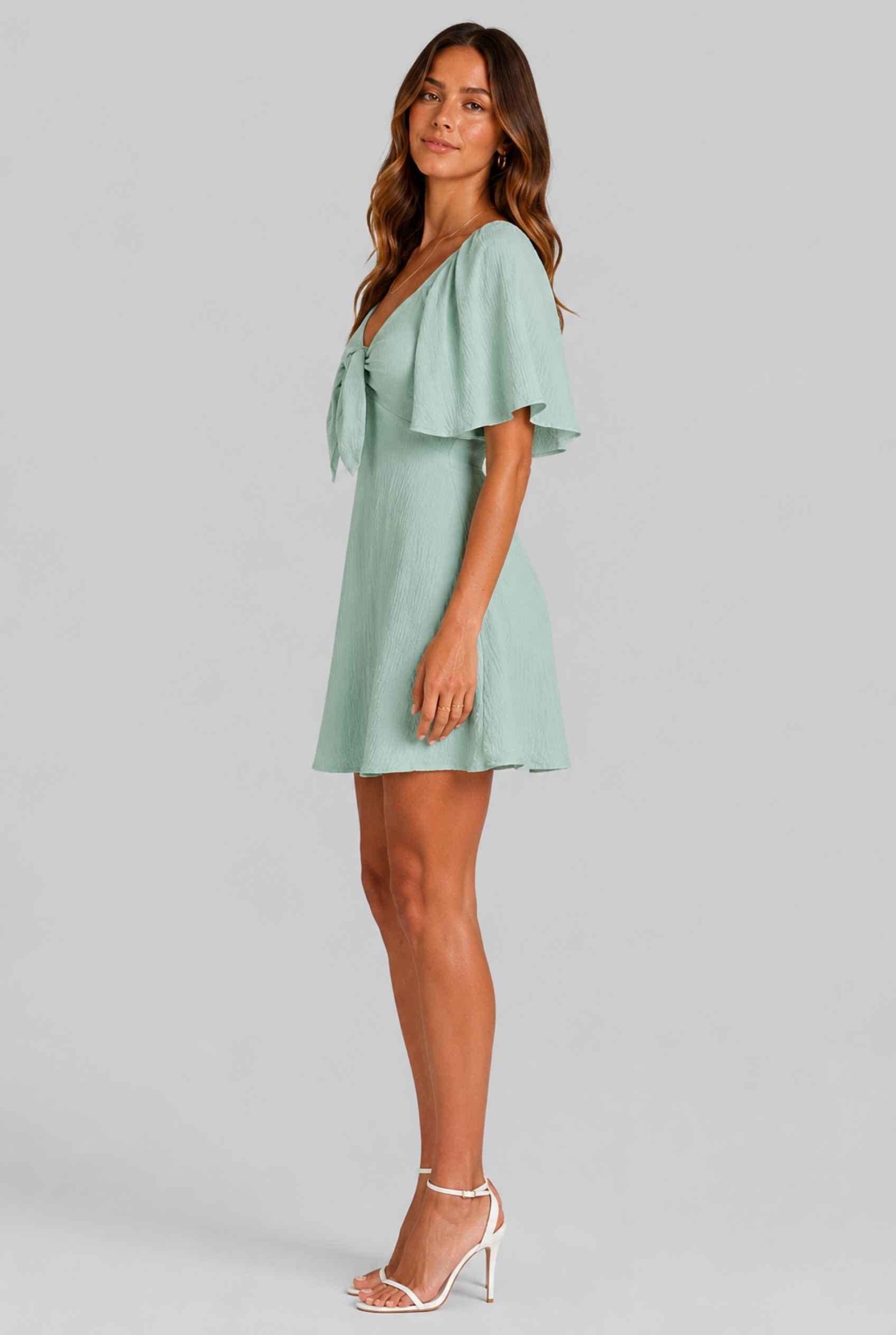 Virtual Model wearing The Melody Flutter Sleeve Mini Tie-Front Flutter-Sleeve Mint Mini Dress