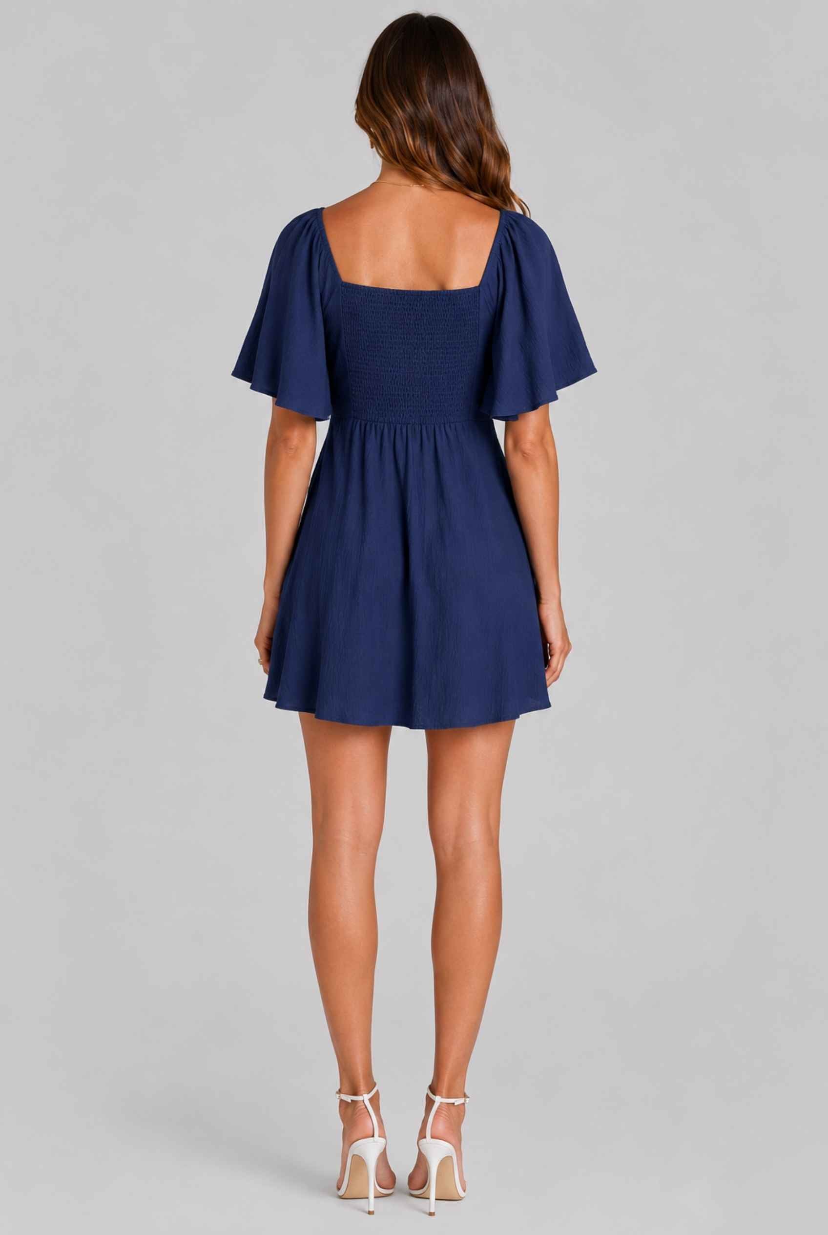 Virtual Model wearing The Melody Flutter Sleeve Mini Tie-Front Flutter-Sleeve Navy Mini Dress