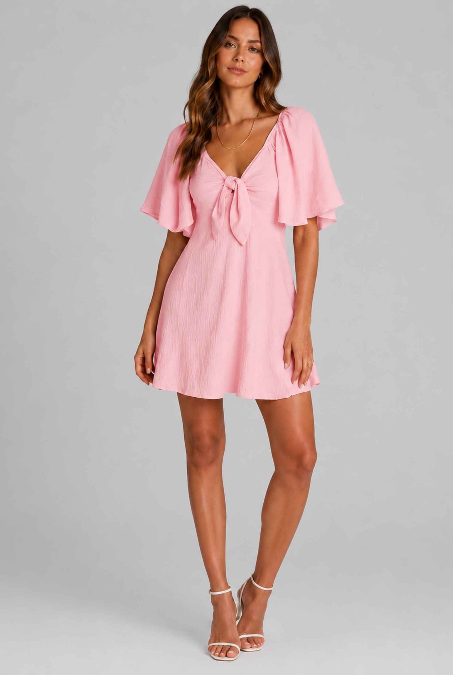 Virtual Model wearing The Melody Flutter Sleeve Mini Tie-Front Flutter-Sleeve Pink Mini Dress