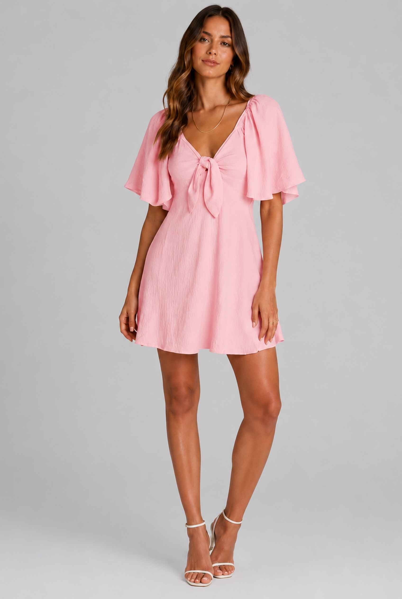 Virtual Model wearing The Melody Flutter Sleeve Mini Tie-Front Flutter-Sleeve Pink Mini Dress