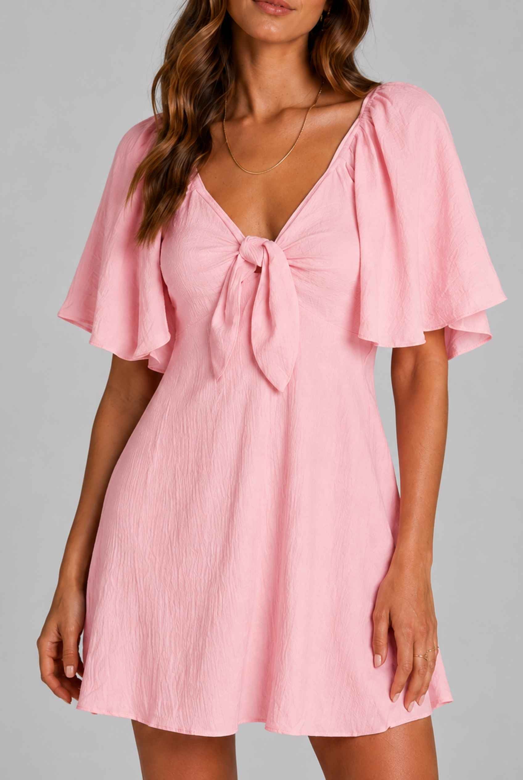 Virtual Model wearing The Melody Flutter Sleeve Mini Tie-Front Flutter-Sleeve Pink Mini Dress