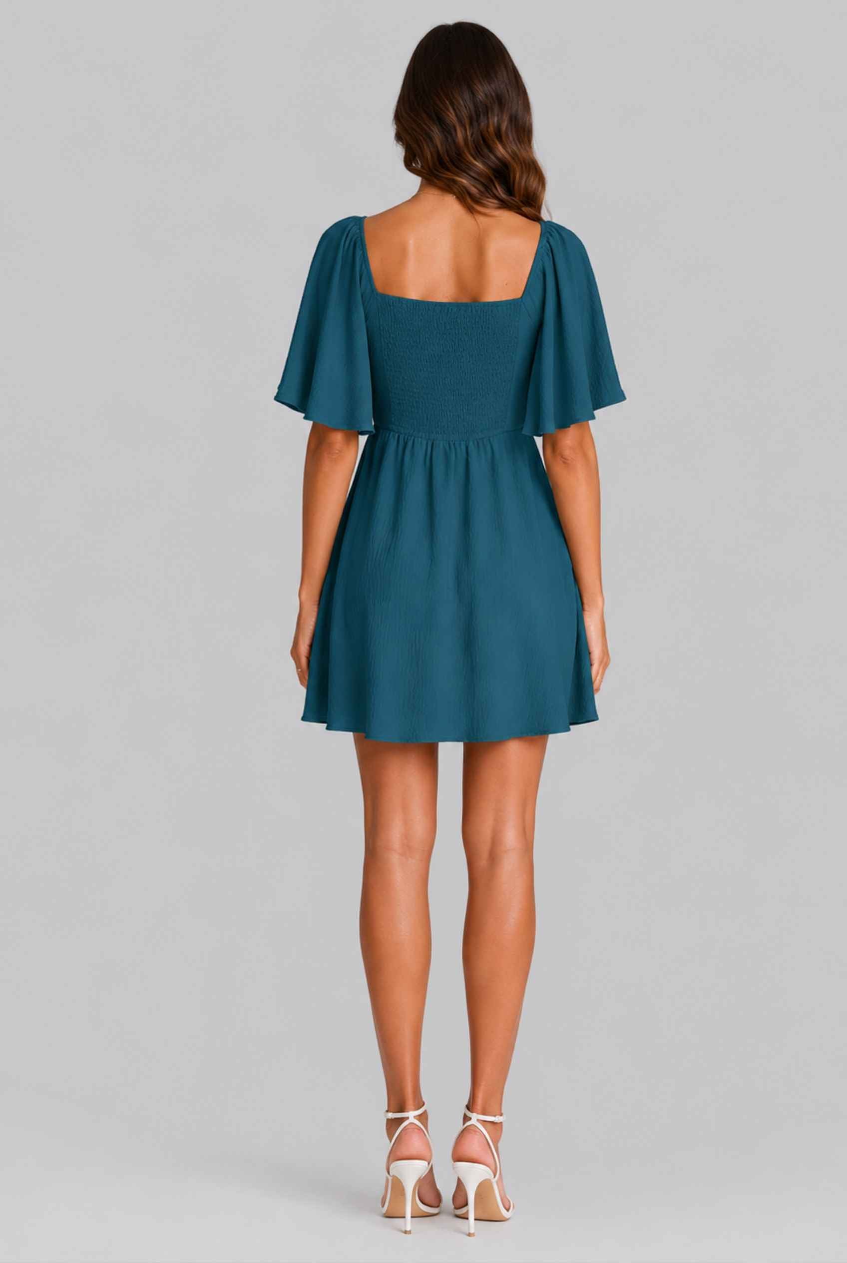 Virtual Model wearing The Melody Flutter Sleeve Mini Tie-Front Flutter-Sleeve Teal Mini Dress
