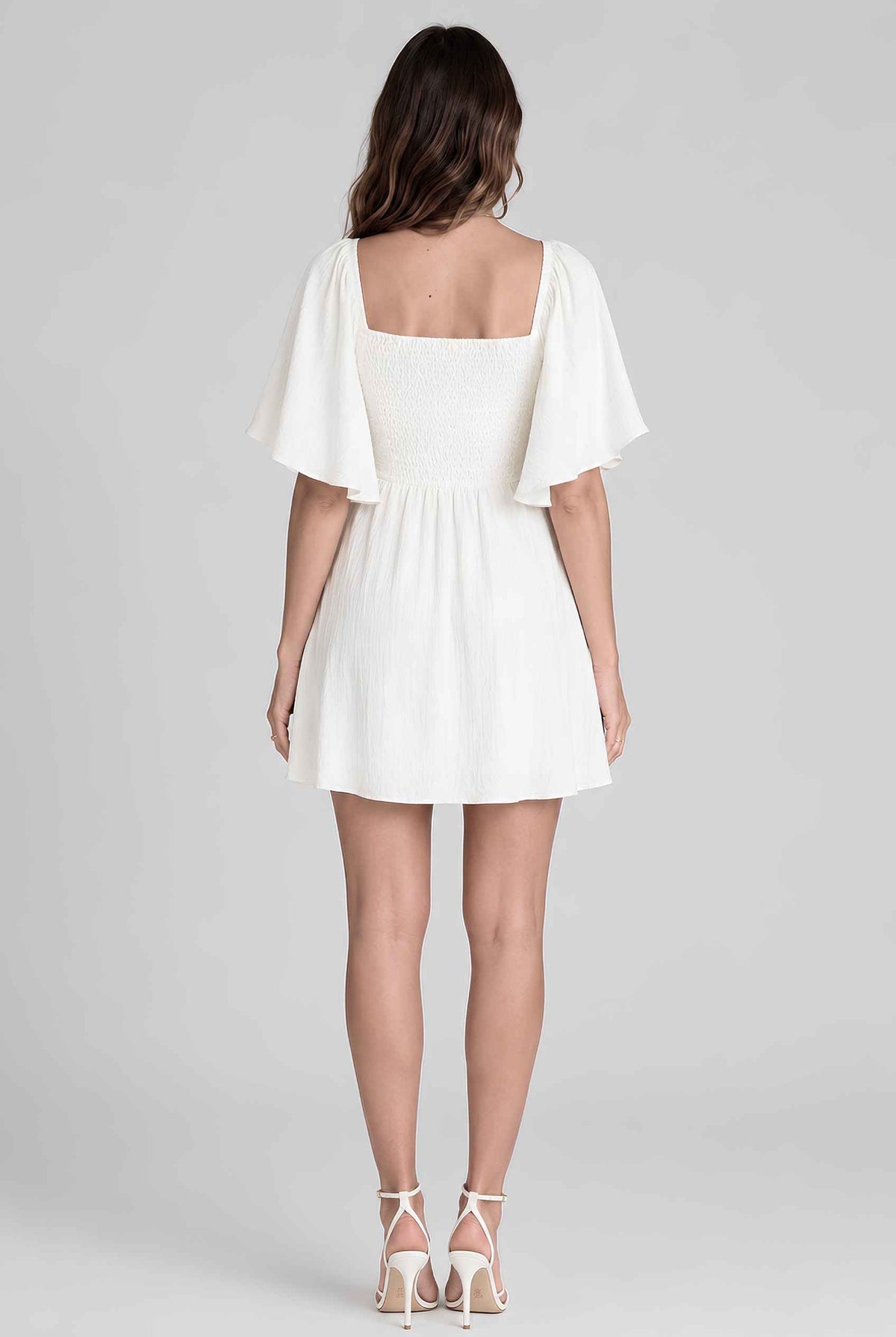 Virtual model wearing The Melody Flutter Sleeve Mini Tie-Front Flutter-Sleeve Mini Dress in White