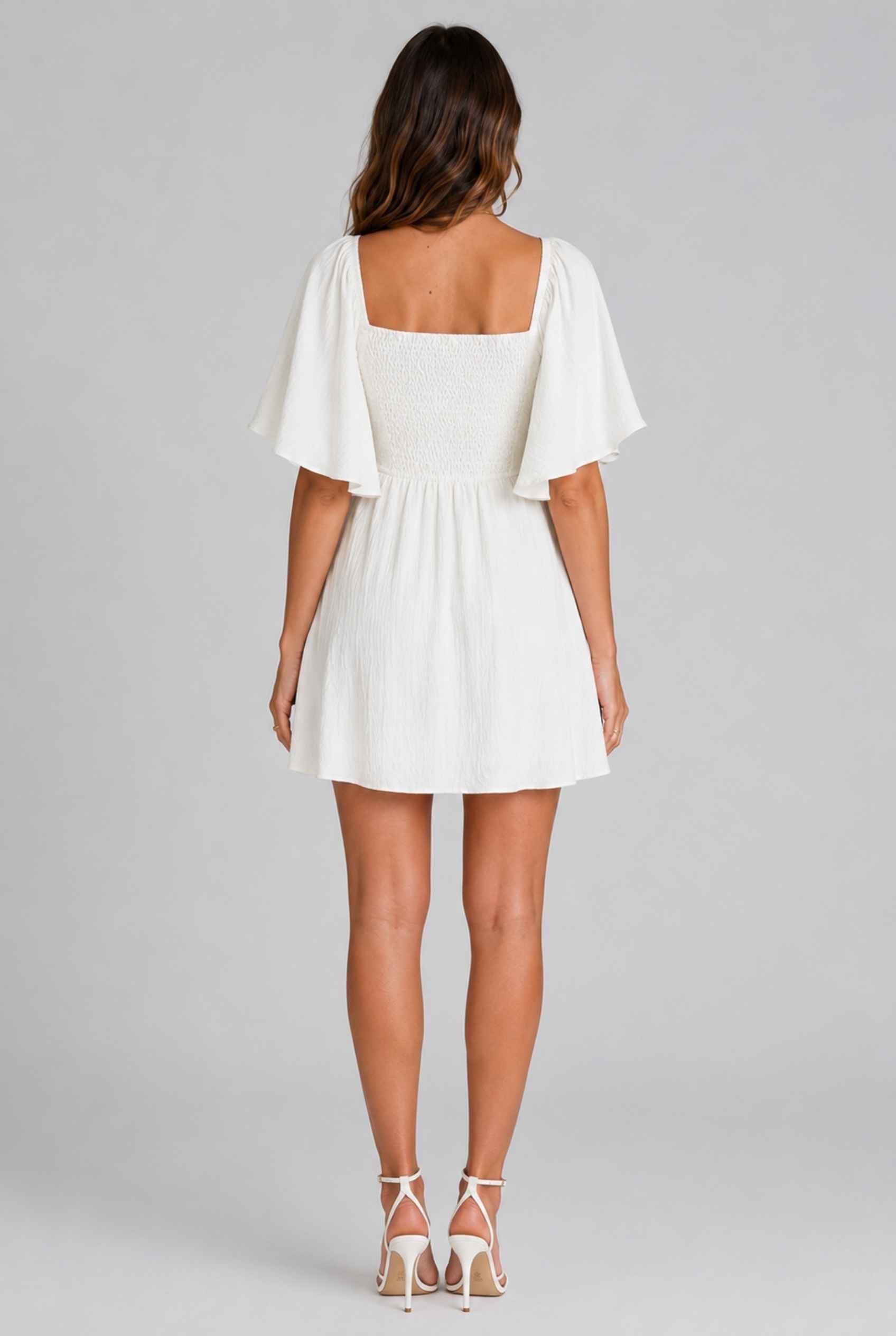 Virtual Model wearing The Melody Flutter Sleeve Mini Tie-Front Flutter-Sleeve White Mini Dress