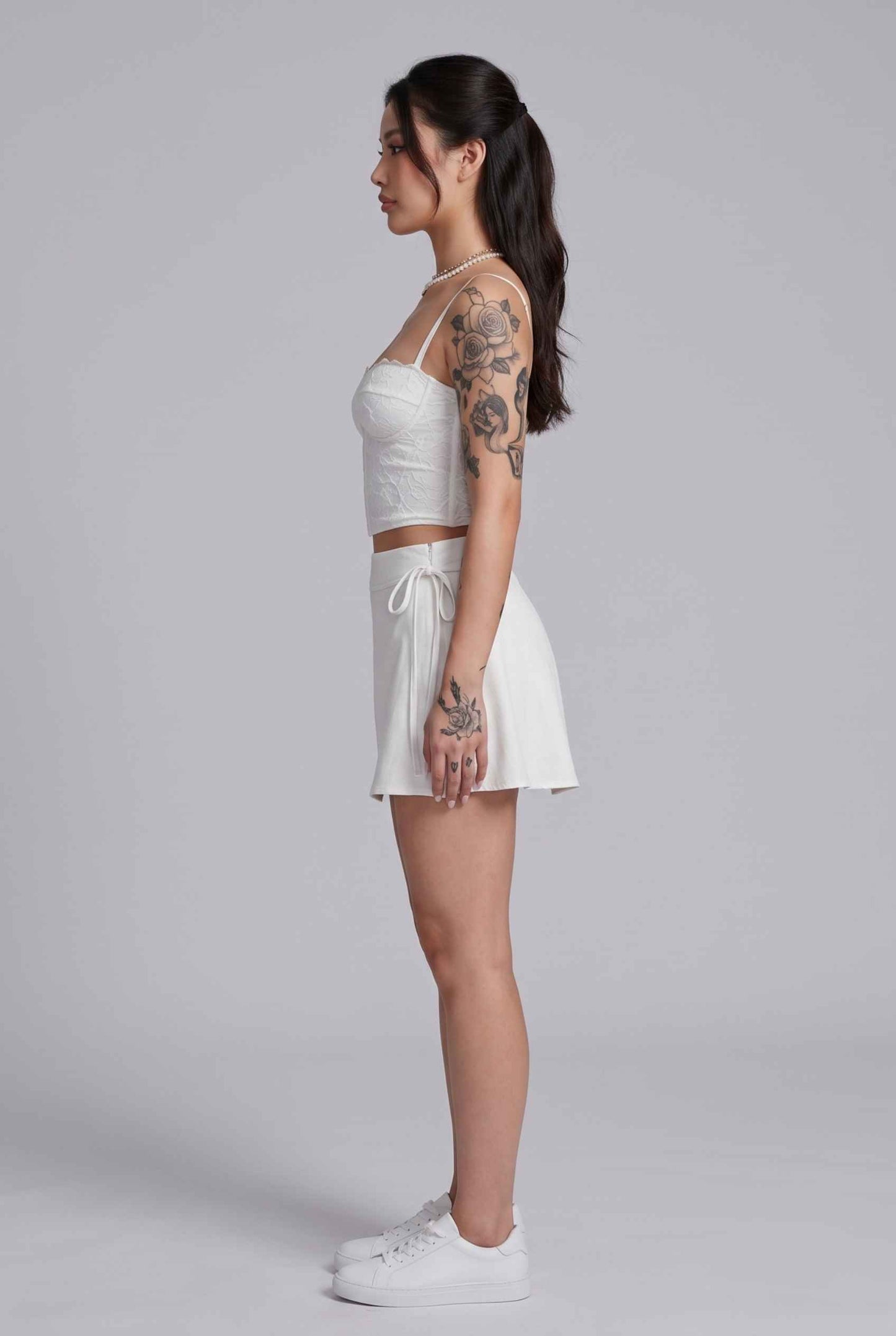Virtual Model wearing The Mykonos Side-Tie Skort Asymmetrical White Wrap Skort