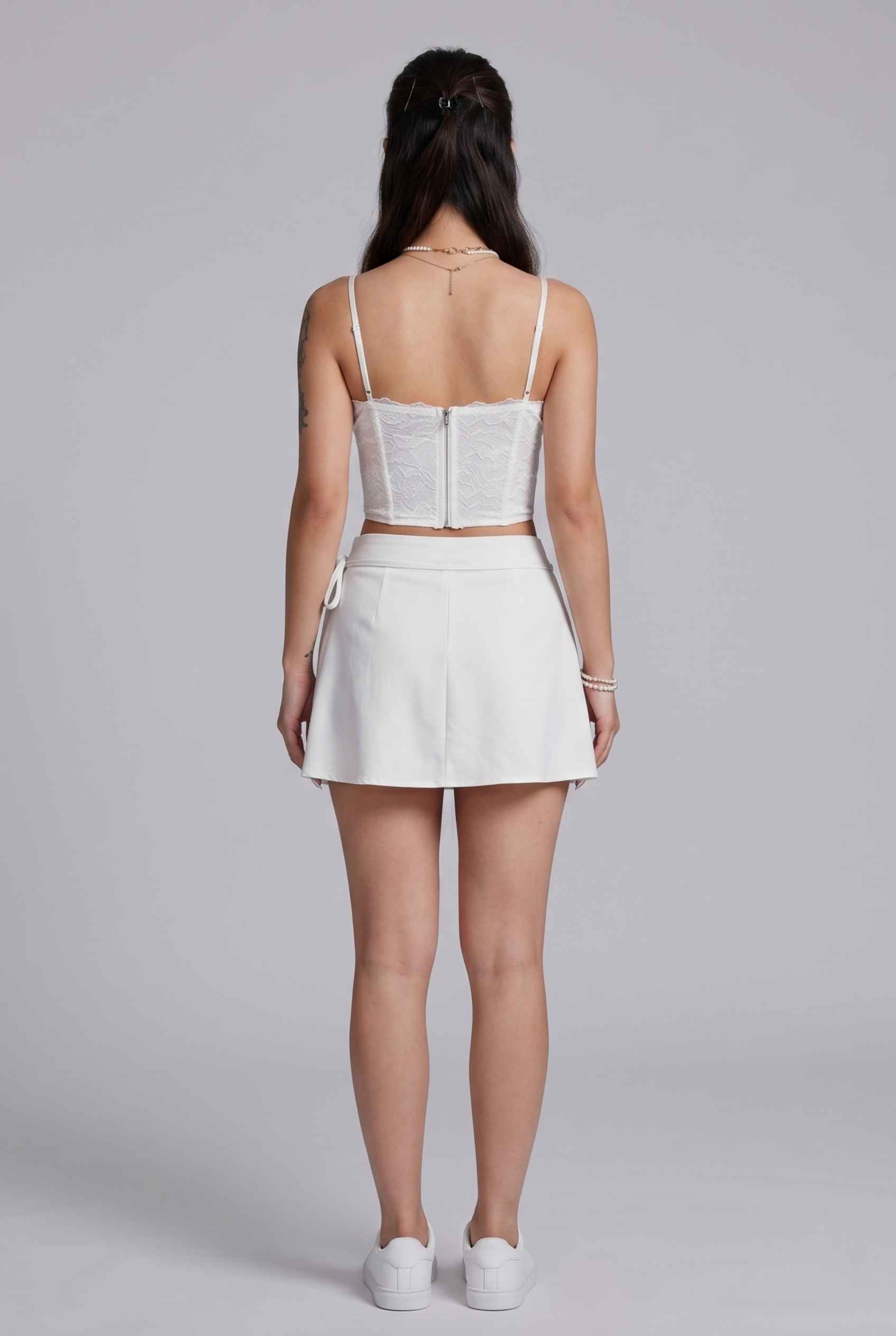 Virtual Model wearing The Mykonos Side-Tie Skort Asymmetrical White Wrap Skort