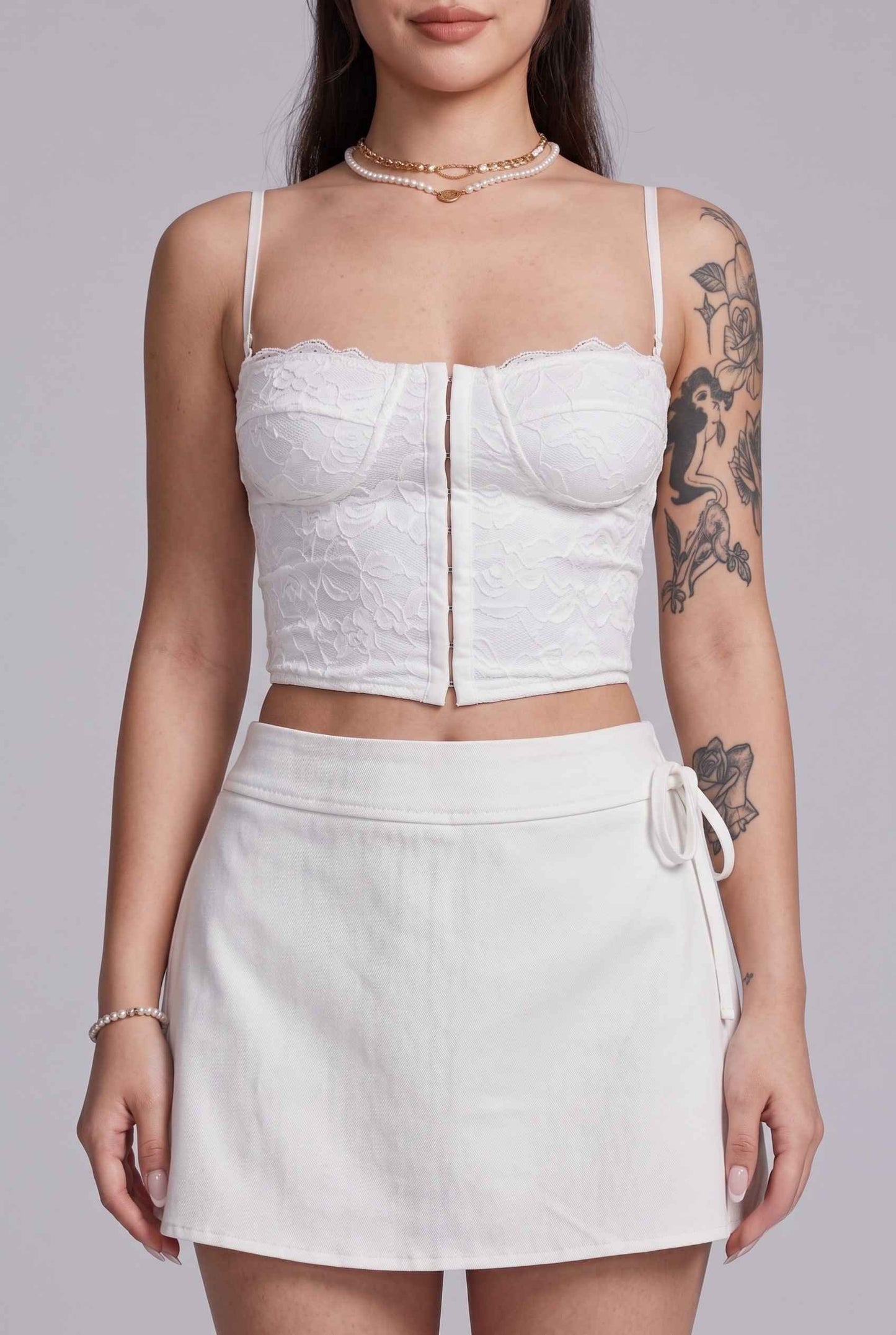 Virtual Model wearing The Mykonos Side-Tie Skort Asymmetrical White Wrap Skort
