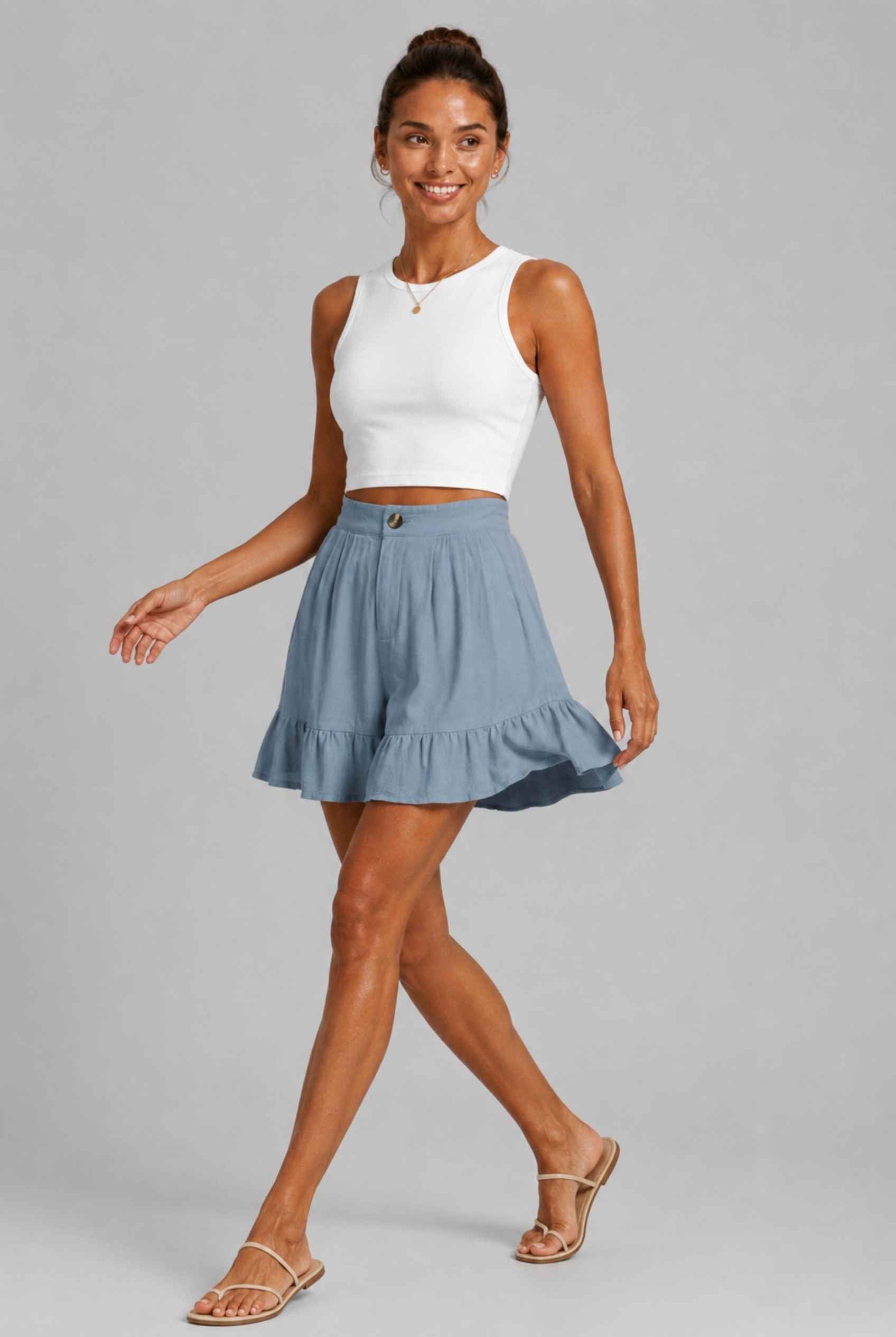 Virtual Model Wearing The Nerina Ruffle Short Blue High-Waisted Wide-Leg Ruffle Hem Shorts