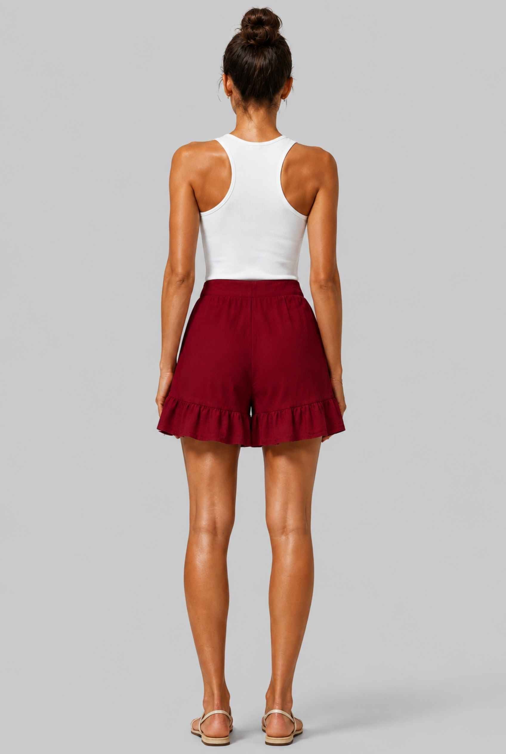 Virtual Model Wearing The Nerina Ruffle Short Burgundy High-Waisted Wide-Leg Ruffle Hem Shorts