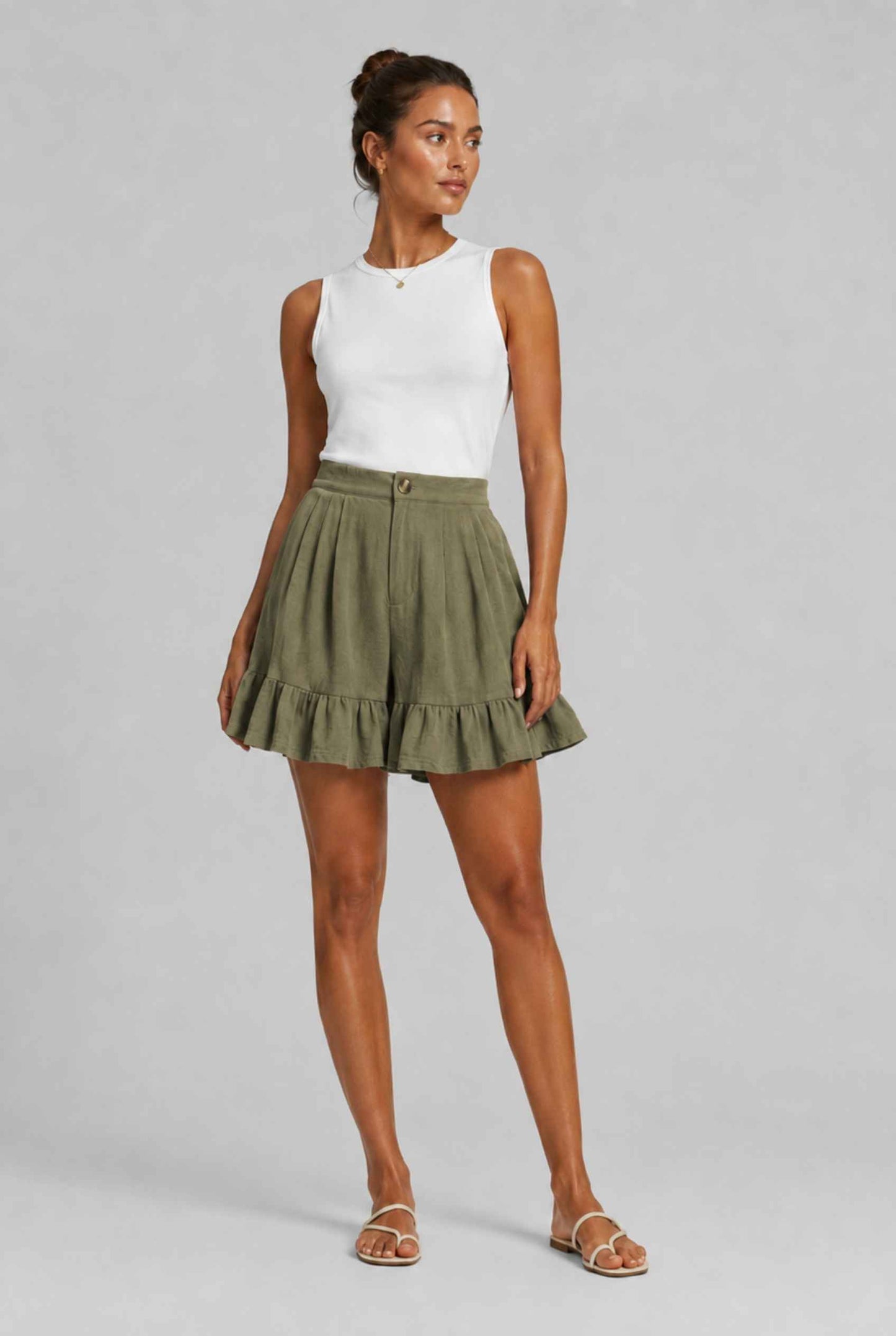 Virtual Model Wearing The Nerina Ruffle Short Dark Green High-Waisted Wide-Leg Ruffle Hem Shorts