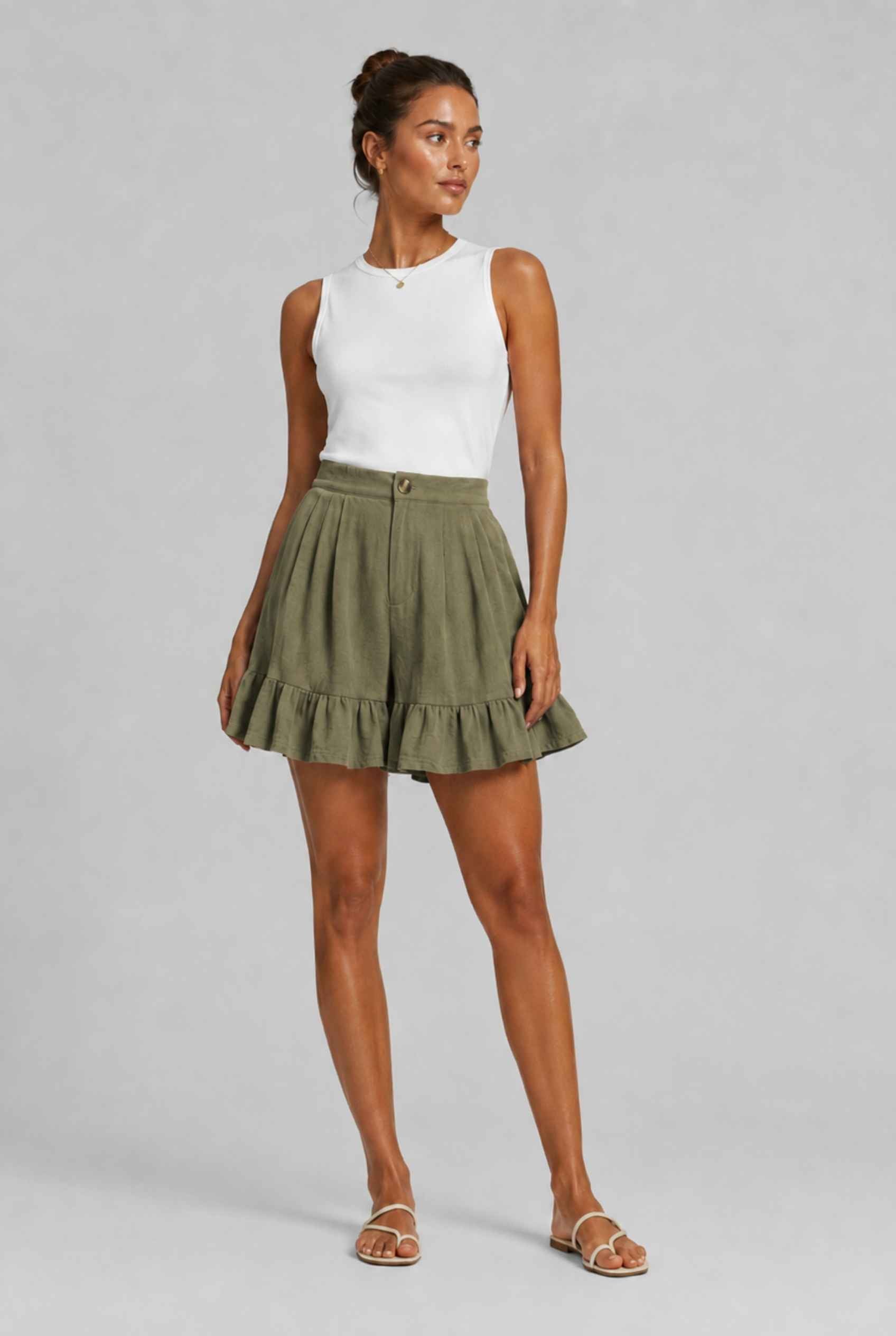 Virtual Model Wearing The Nerina Ruffle Short Dark Green High-Waisted Wide-Leg Ruffle Hem Shorts