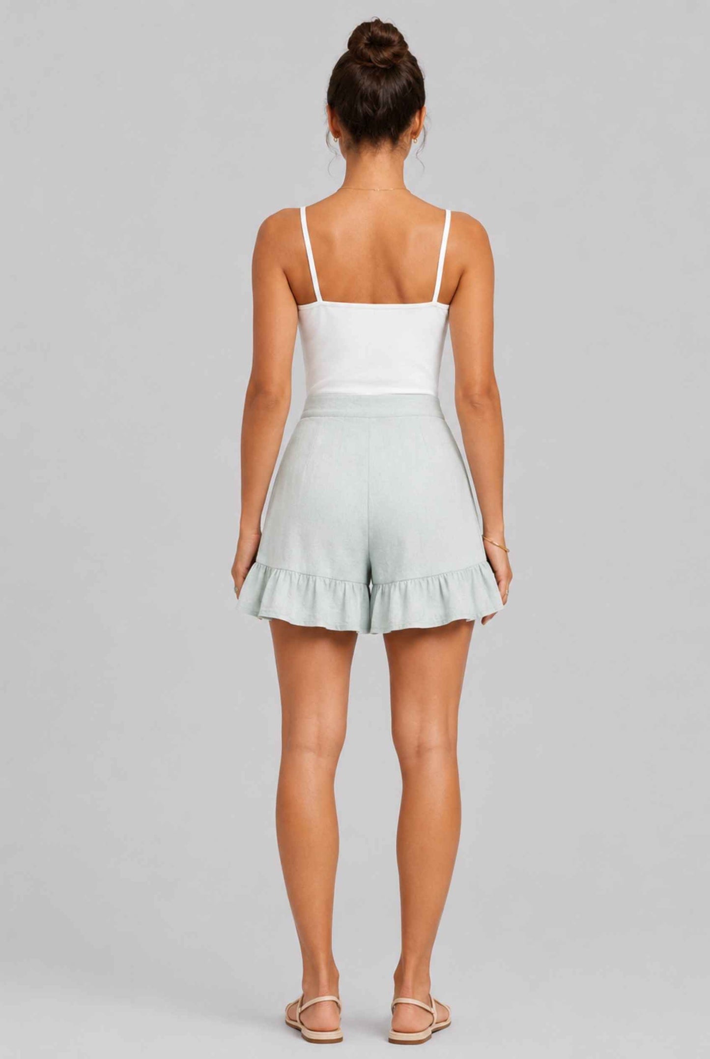 Virtual Model Wearing The Nerina Ruffle Short Mint High-Waisted Wide-Leg Ruffle Hem Shorts