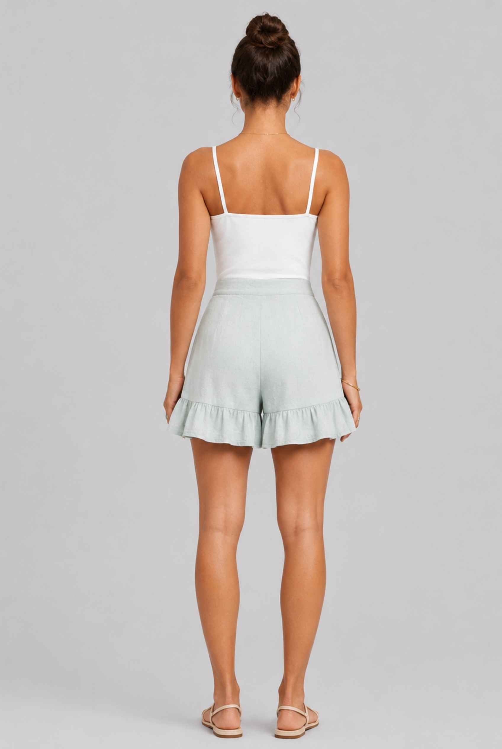 Virtual Model Wearing The Nerina Ruffle Short Mint High-Waisted Wide-Leg Ruffle Hem Shorts