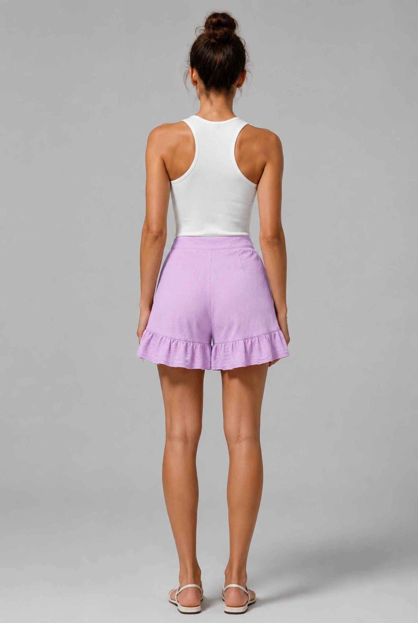 Virtual Model Wearing The Nerina Ruffle Short Purple High-Waisted Wide-Leg Ruffle Hem Shorts