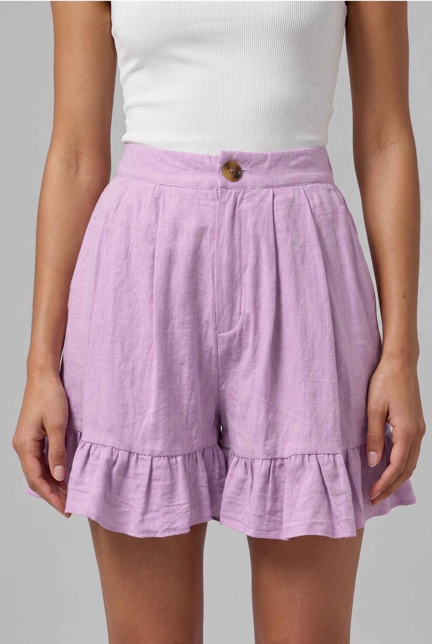 Virtual Model Wearing The Nerina Ruffle Short Purple High-Waisted Wide-Leg Ruffle Hem Shorts