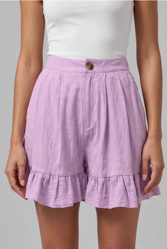 Virtual Model Wearing The Nerina Ruffle Short Purple High-Waisted Wide-Leg Ruffle Hem Shorts