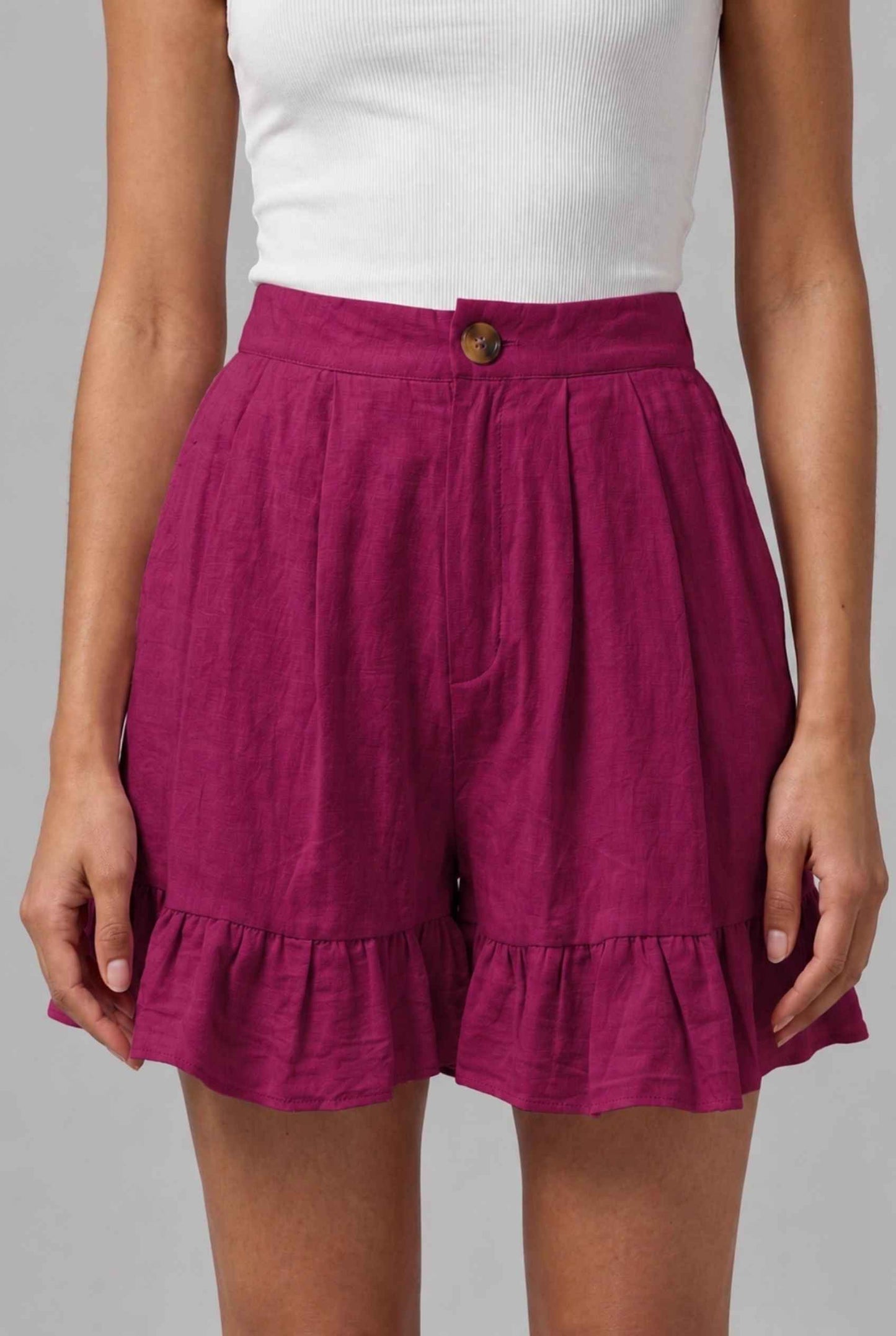 Virtual Model Wearing The Nerina Ruffle Short Rose High-Waisted Wide-Leg Ruffle Hem Shorts