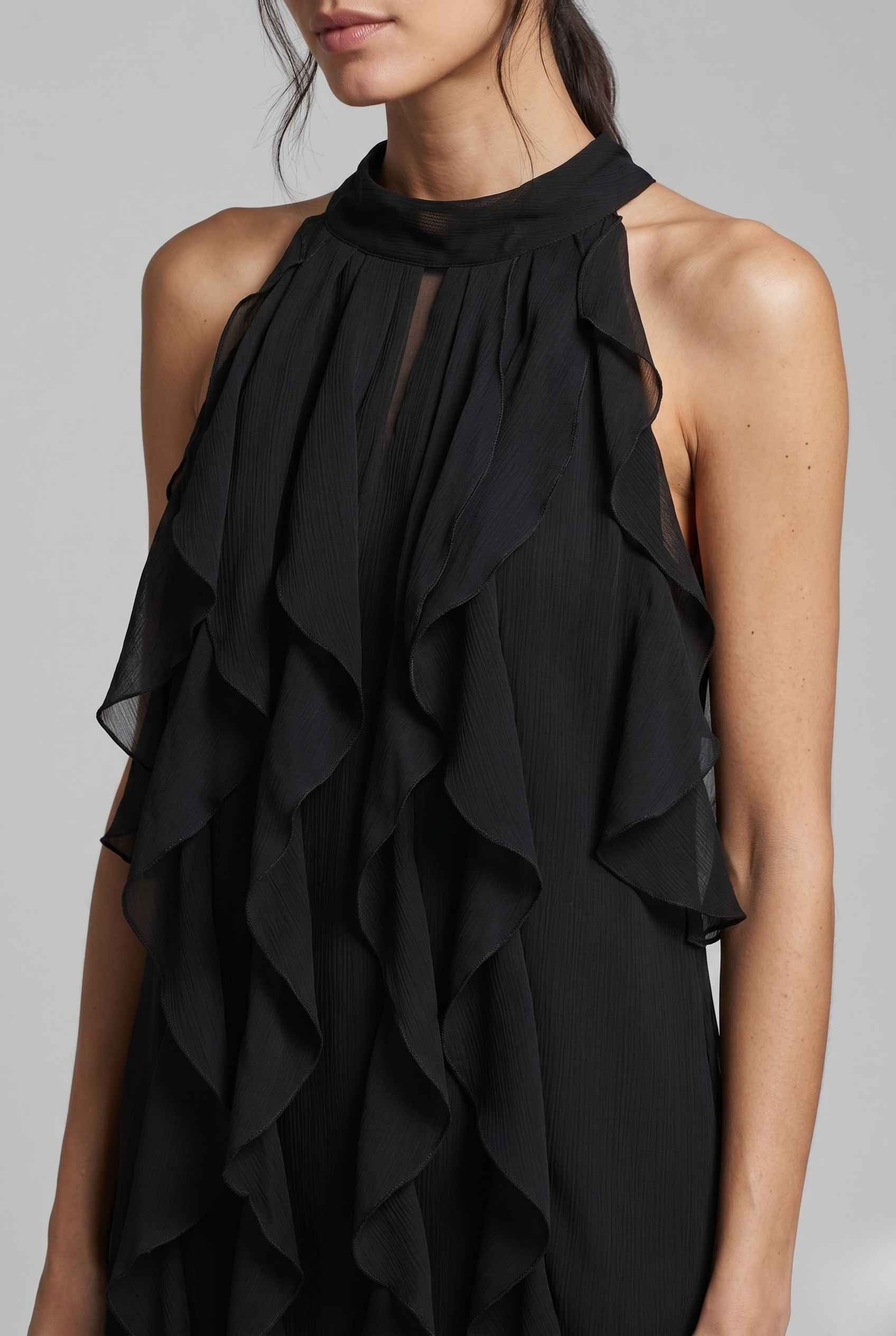 Virtual Model Wearing The Noelle Ruffle Chiffon Blouse Elegant Black Chiffon Blouse