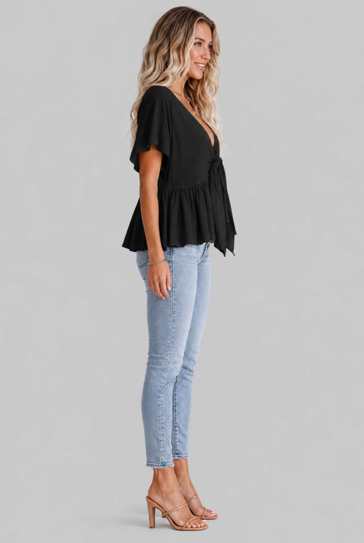Virtual Model wearing The Paloma Tied Peplum Top Cotton Slub Black Tie-Front Top
