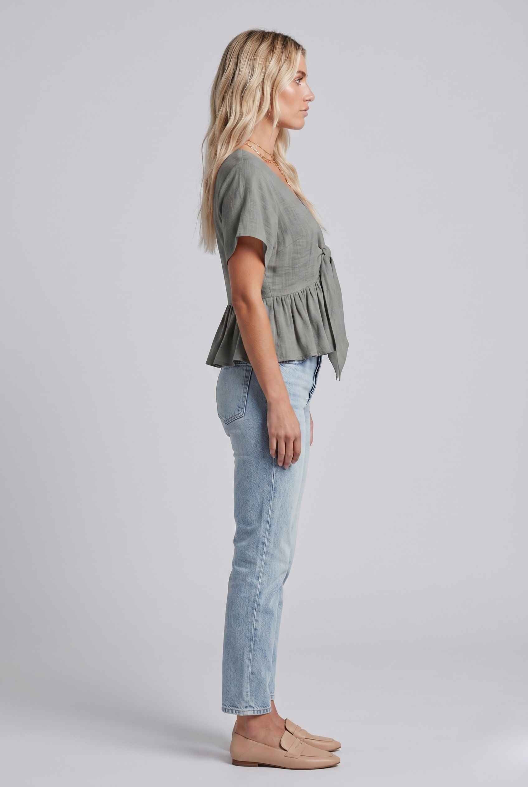 Virtual Model wearing The Paloma Tied Peplum Top Cotton Slub Light Gray Tie-Front Top