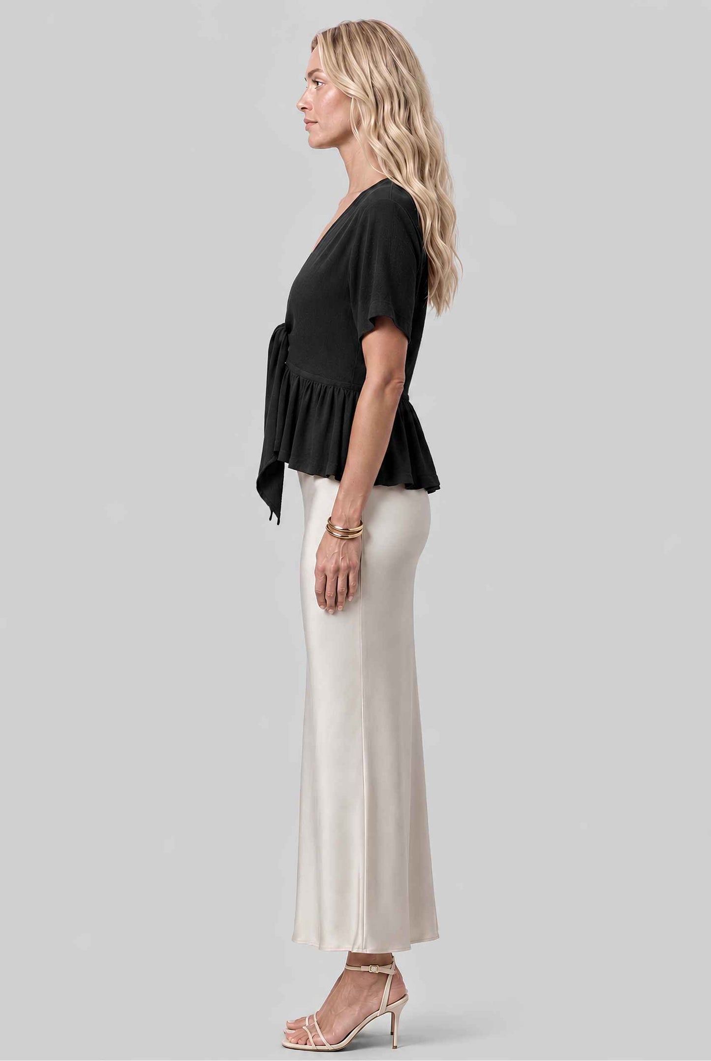 Virtual model wearing The Paloma Tied Peplum Top Cotton Slub Tie-Front Top in Black