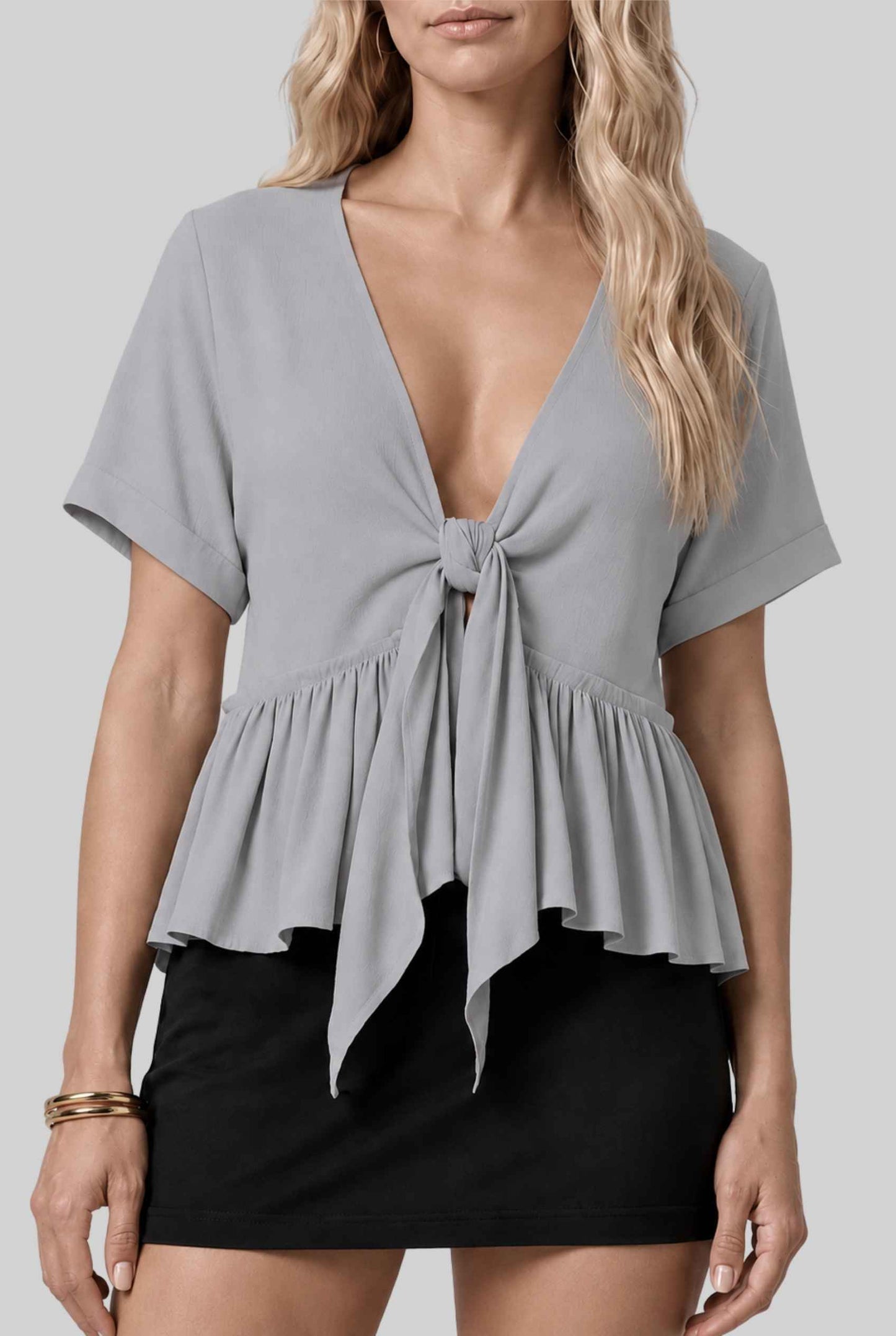 Virtual model wearing The Paloma Tied Peplum Top Cotton Slub Tie-Front Top in Light Gray