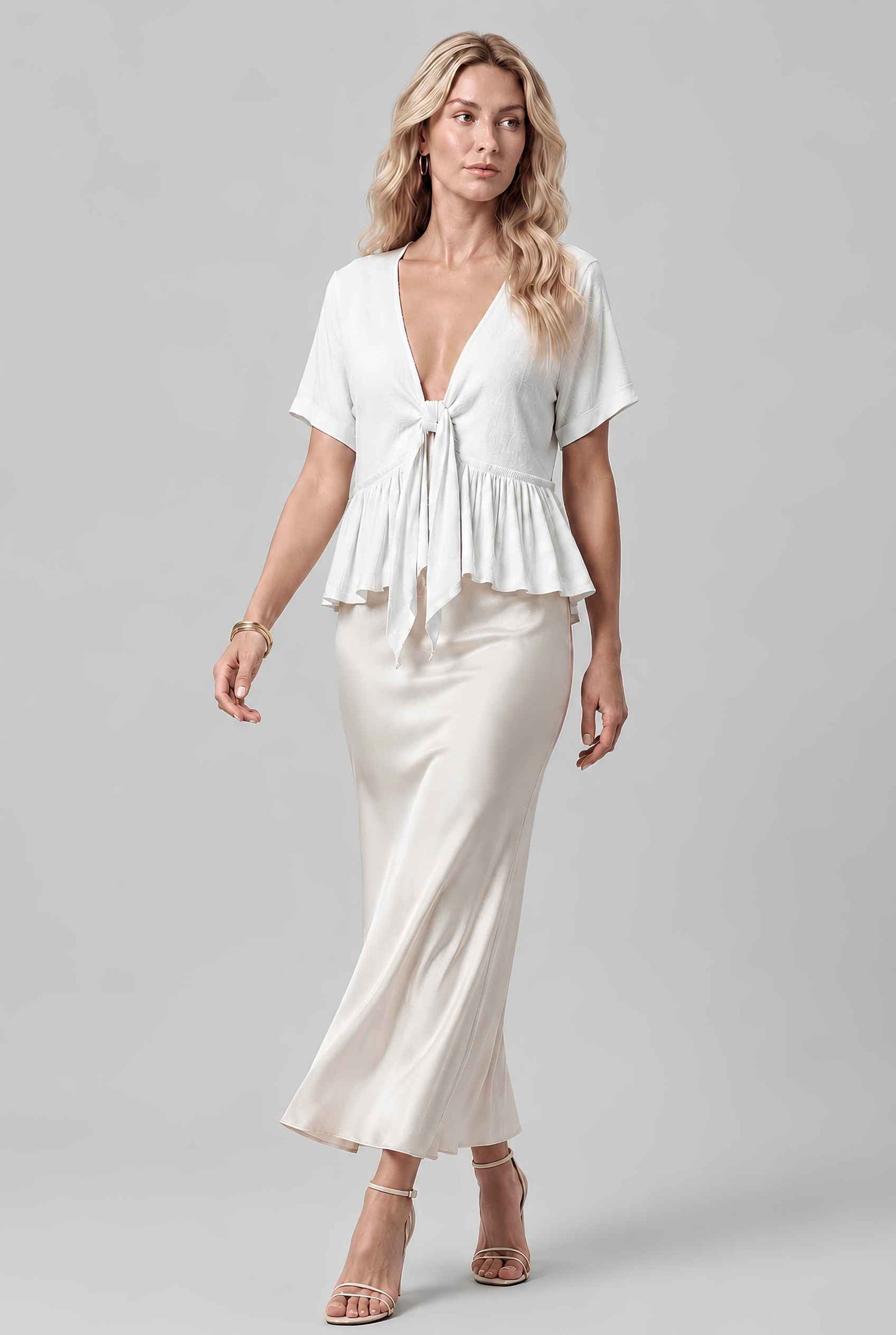 Virtual model wearing The Paloma Tied Peplum Top Cotton Slub Tie-Front Top in White