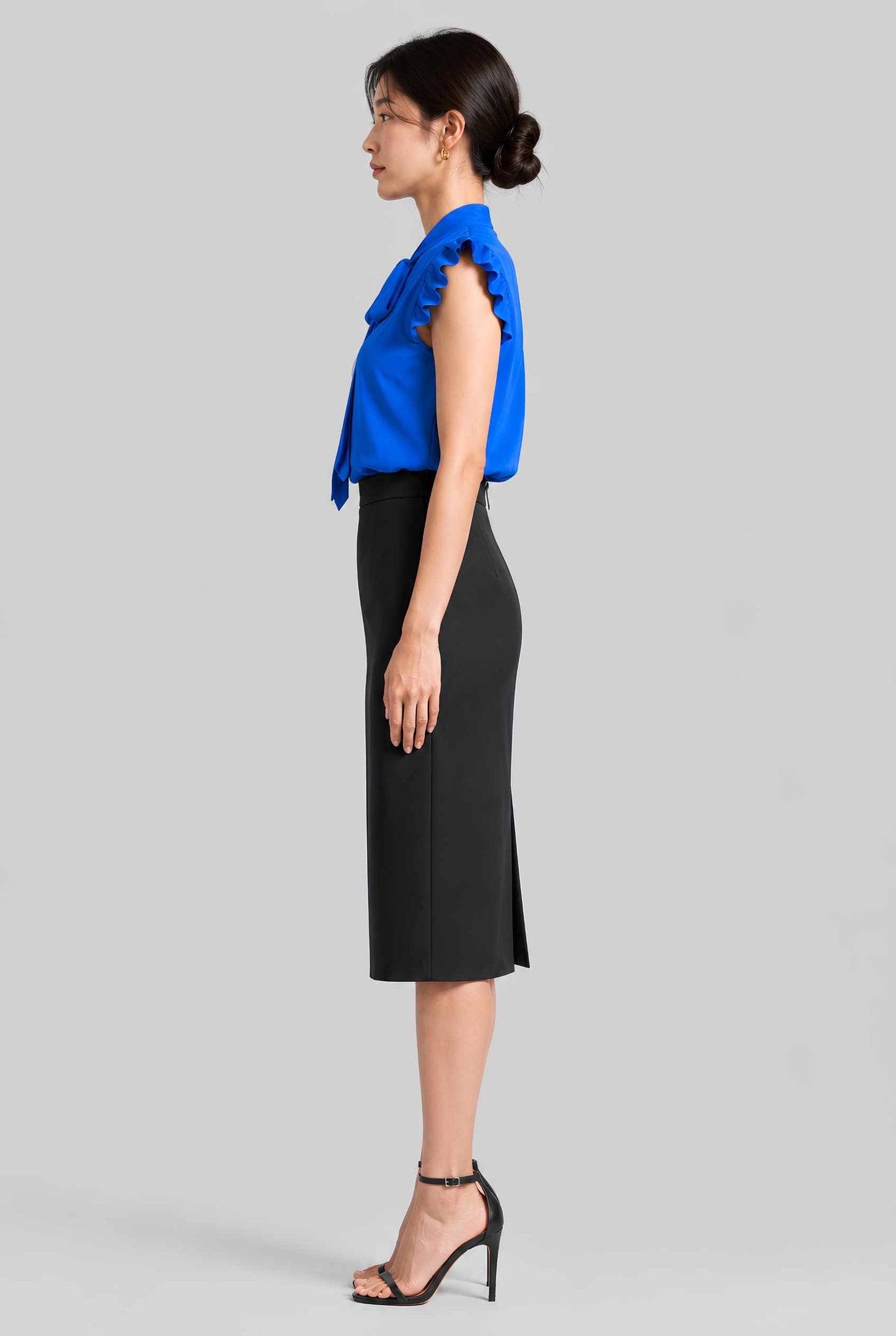 Virtual model wearing The Ramona Tied Blouse Bow Tie-Up Flutter Sleeve Blouse in Blue