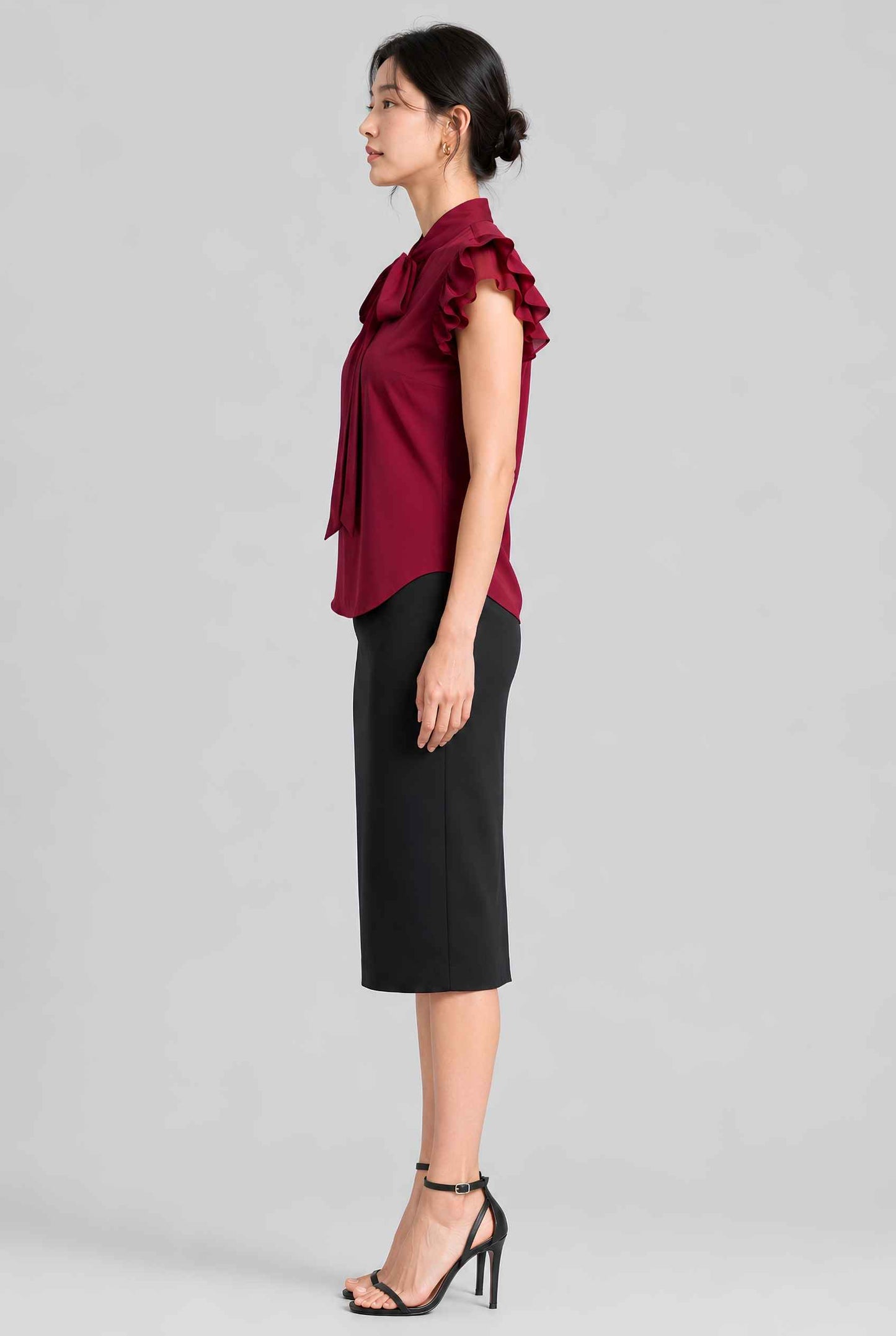 Virtual model wearing The Ramona Tied Blouse Bow Tie-Up Flutter Sleeve Blouse in Burgundy