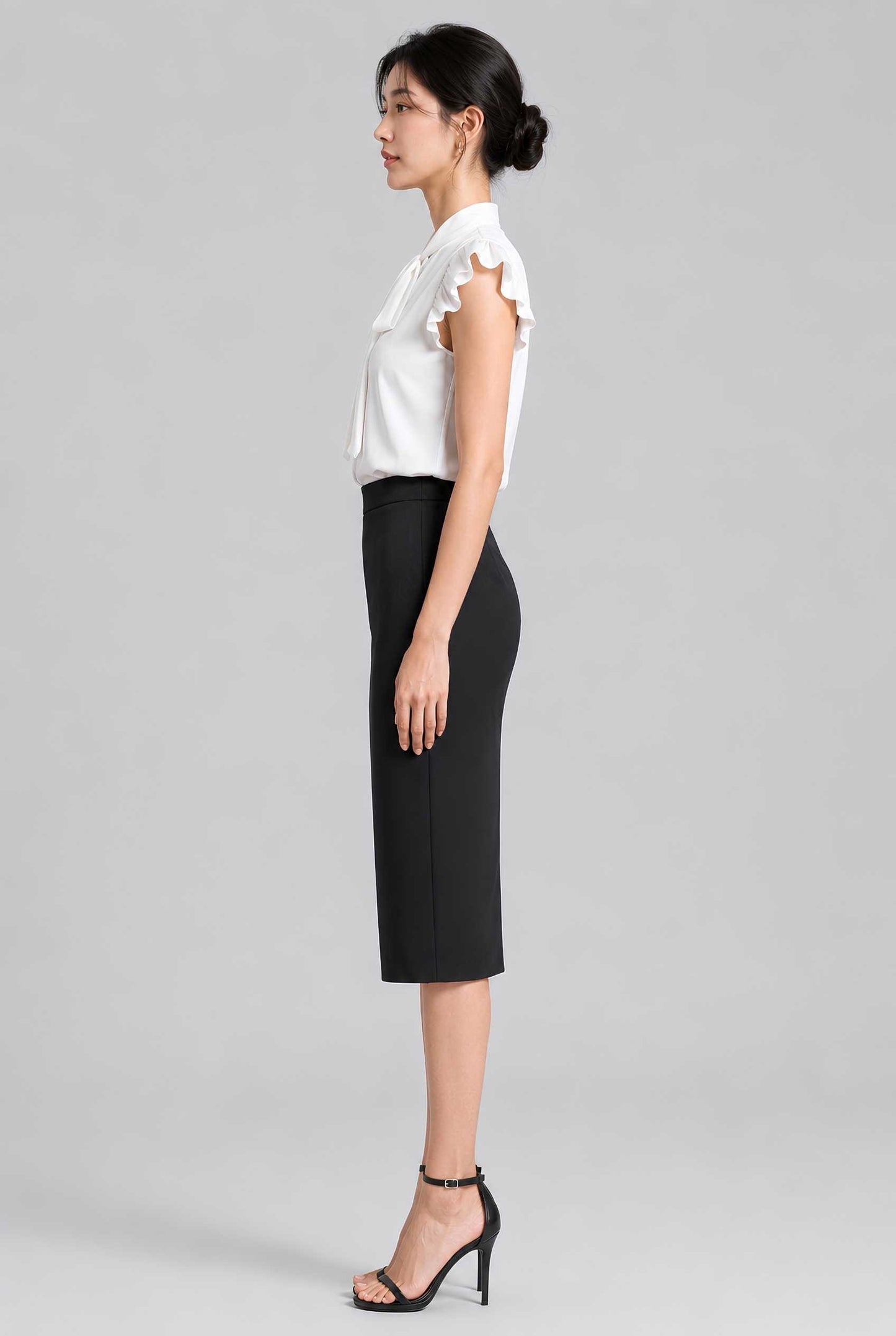 Virtual model wearing The Ramona Tied Blouse Bow Tie-Up Flutter Sleeve Blouse in White