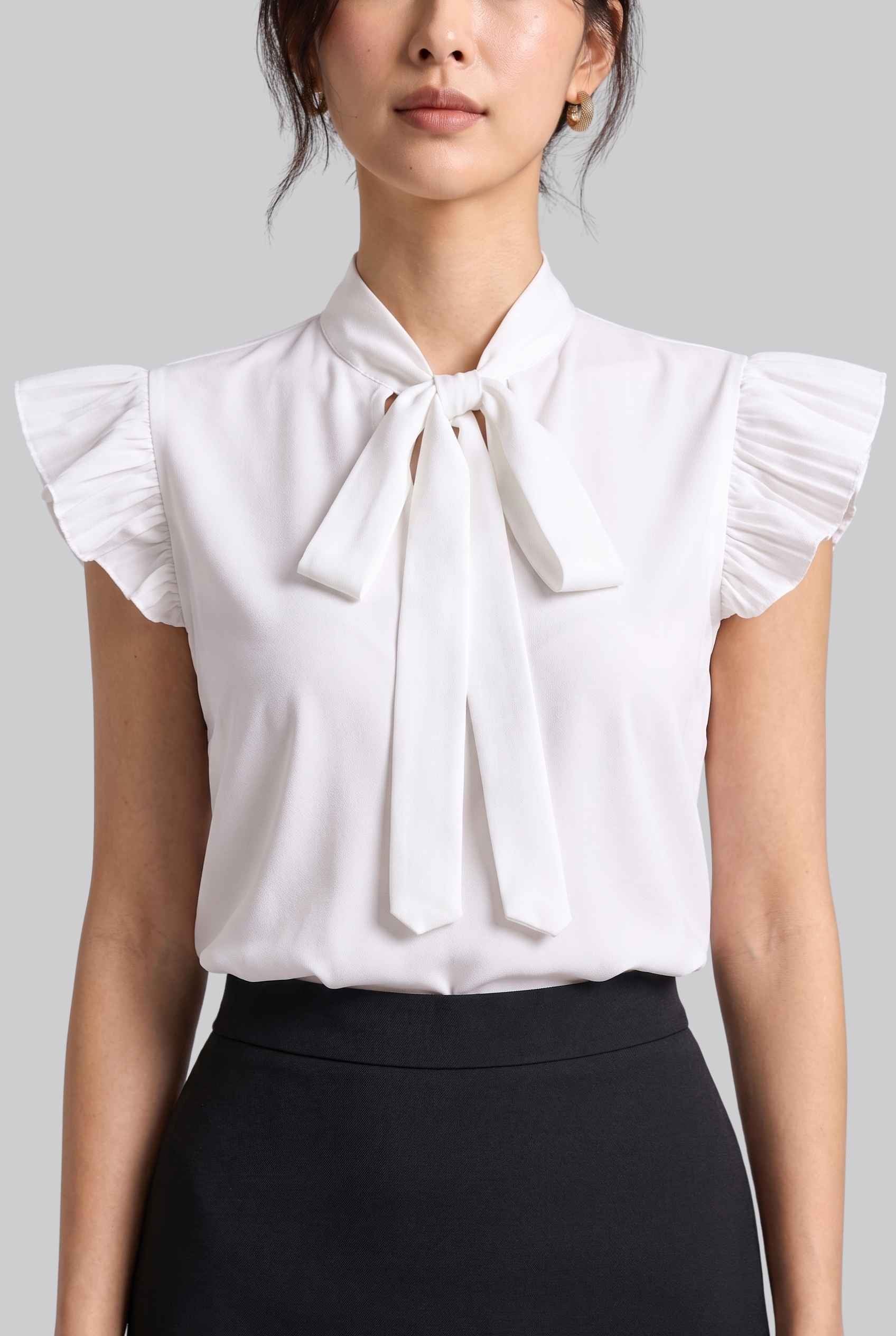 Virtual model wearing The Ramona Tied Blouse Bow Tie-Up Flutter Sleeve Blouse in White