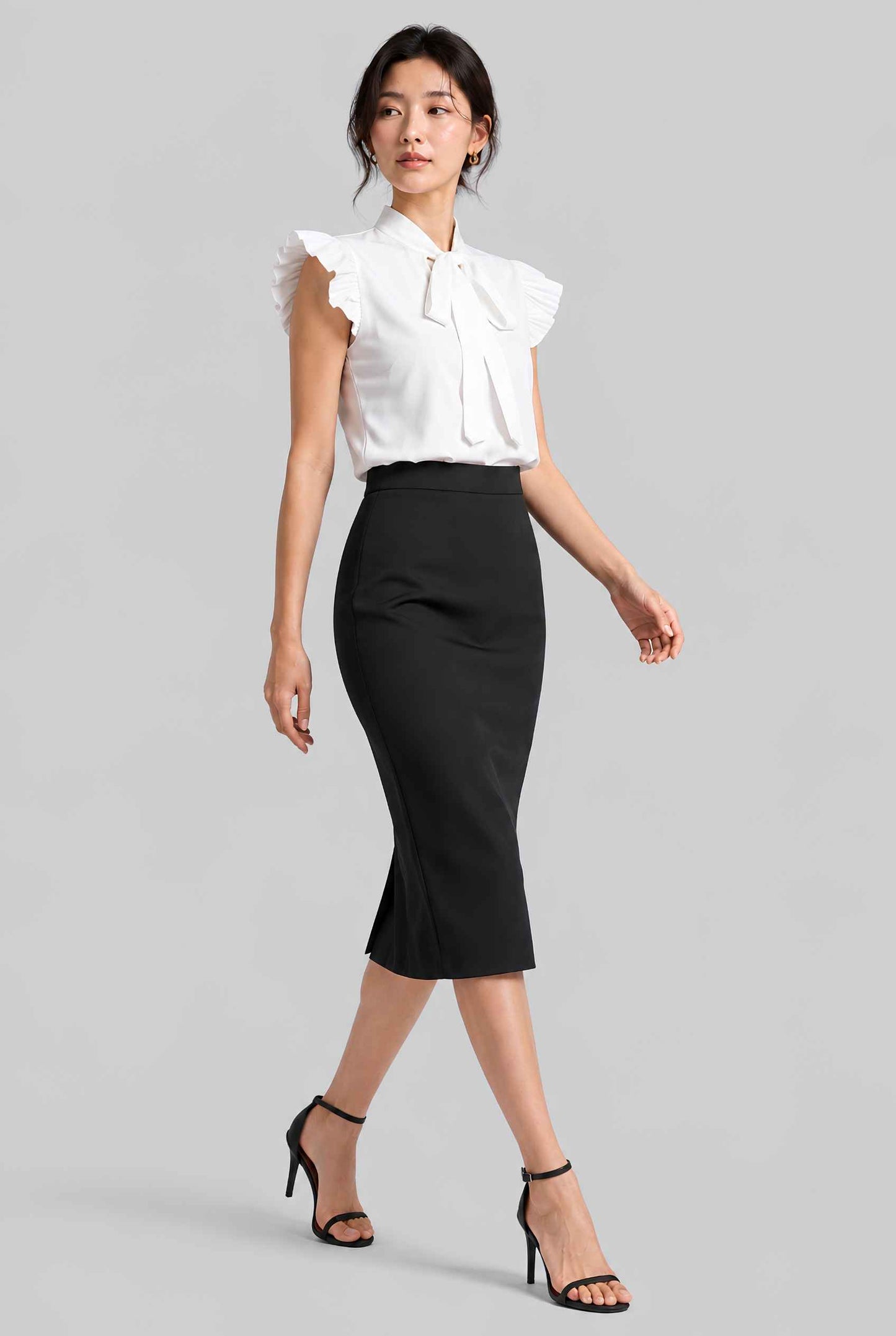Virtual model wearing The Ramona Tied Blouse Bow Tie-Up Flutter Sleeve Blouse in White