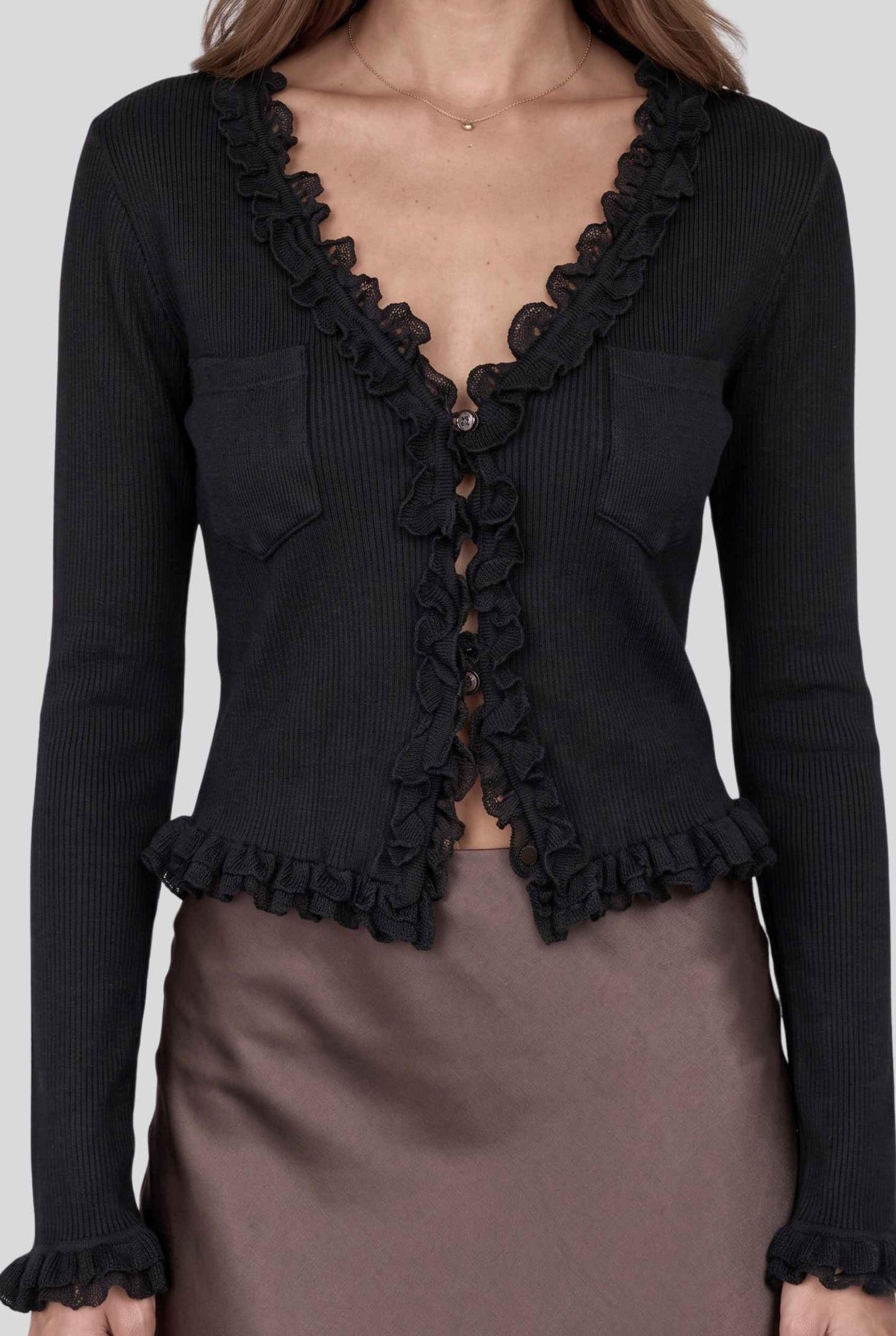 Virtual model wearing The Rosalie Lace Cardigan Ruffled Ribbed Knit Buttoned Cardigan in Black