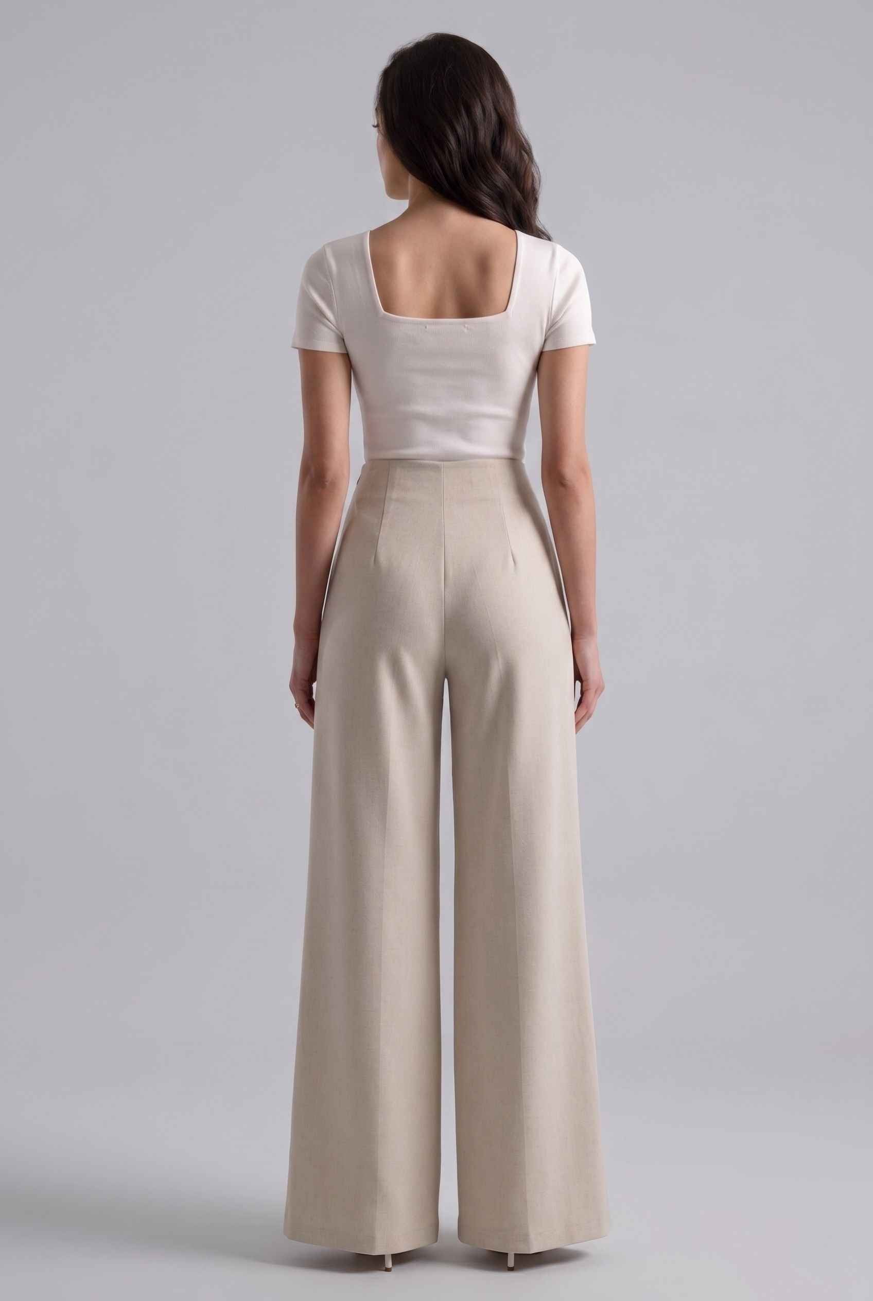 Virtual Model wearing The Rowan Wide-Leg Trouser Asymmetric Beige Pleated Pant