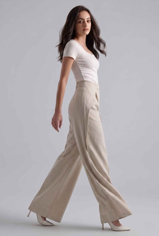 Virtual Model wearing The Rowan Wide-Leg Trouser Asymmetric Beige Pleated Pant