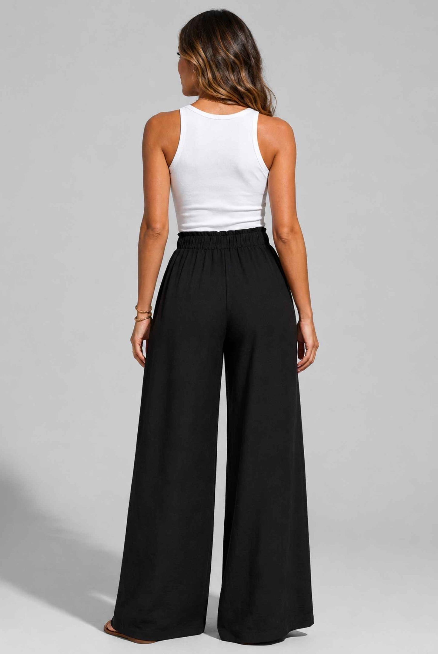 Virtual Model wearing The Savannah Textured Pant Wide Leg Paperbag Black Resort Pant