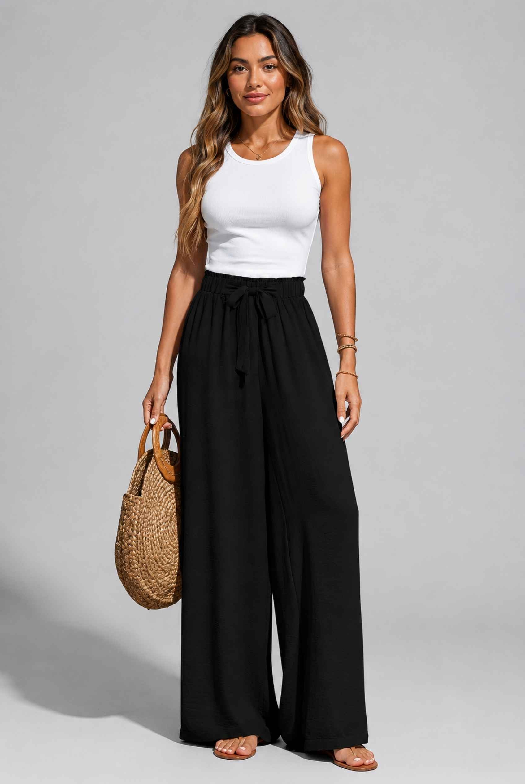 Virtual Model wearing The Savannah Textured Pant Wide Leg Paperbag Black Resort Pant