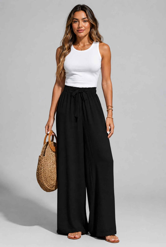 Virtual Model wearing The Savannah Textured Pant Wide Leg Paperbag Black Resort Pant