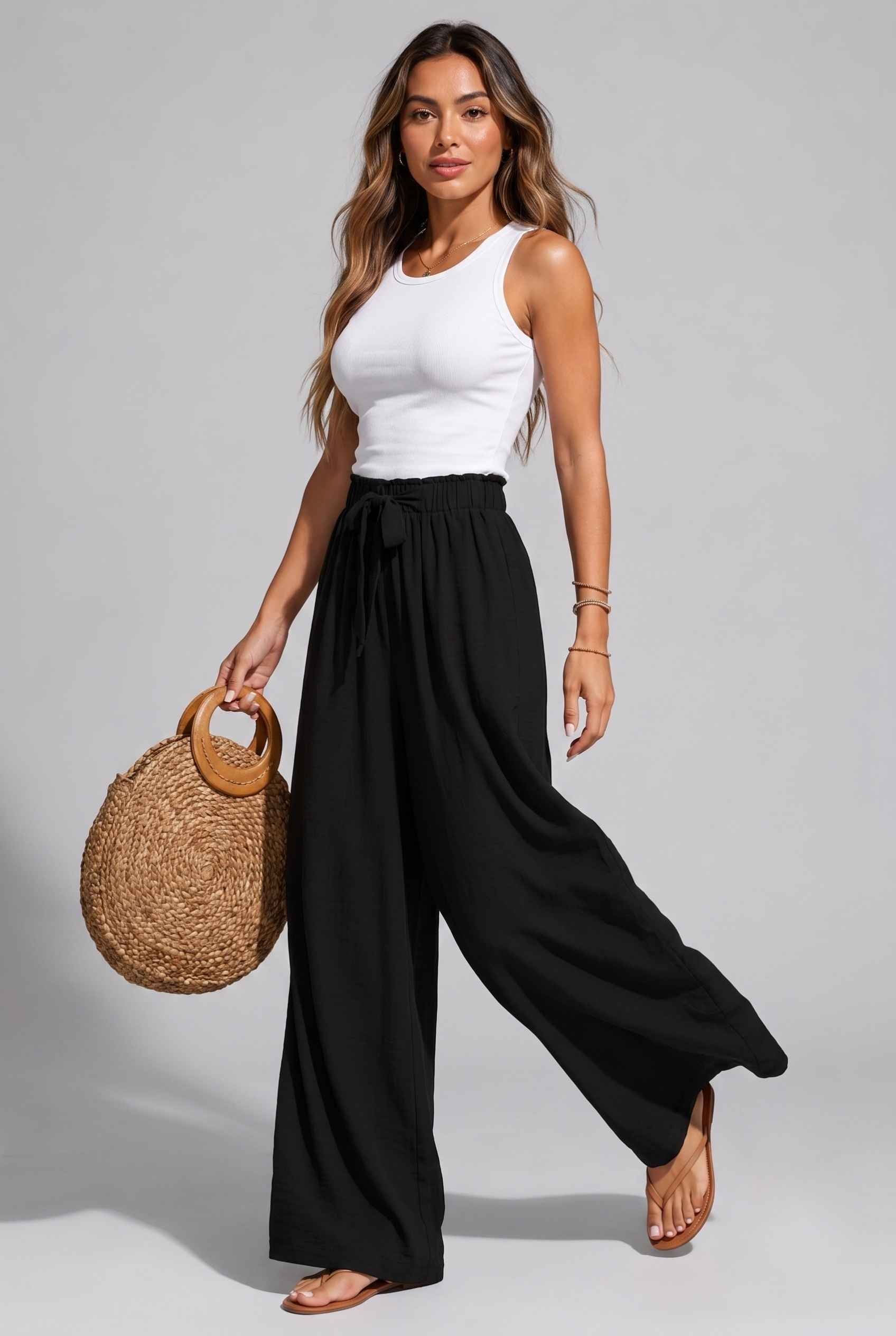 Virtual Model wearing The Savannah Textured Pant Wide Leg Paperbag Black Resort Pant