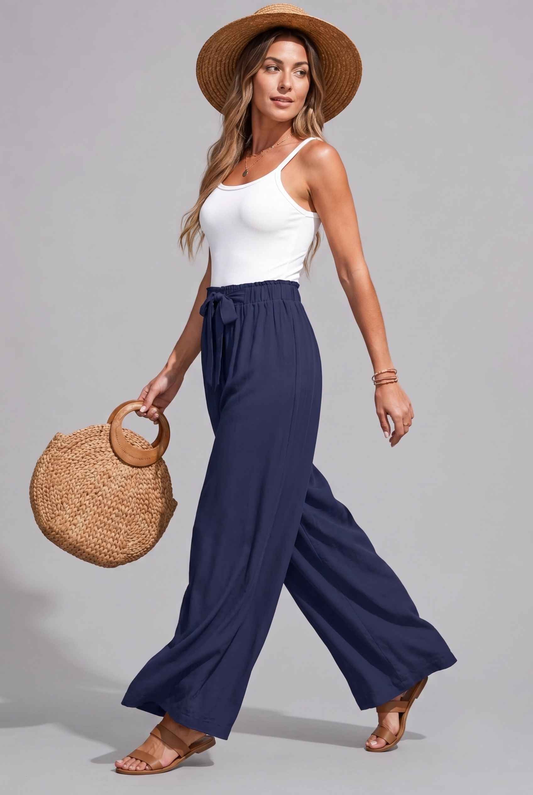 Virtual Model wearing The Savannah Textured Pant Wide Leg Paperbag Navy Resort Pant
