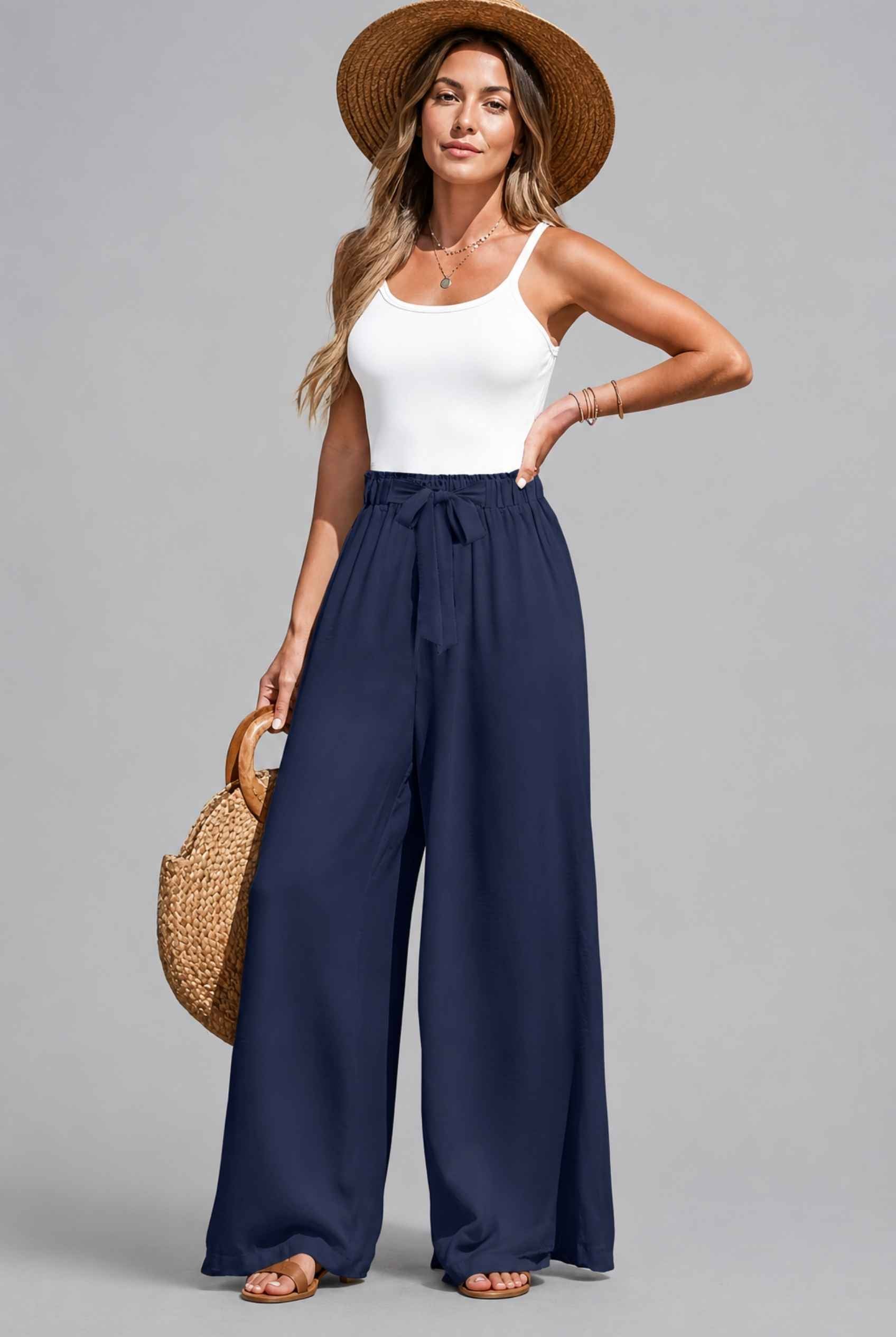 Virtual Model wearing The Savannah Textured Pant Wide Leg Paperbag Navy Resort Pant