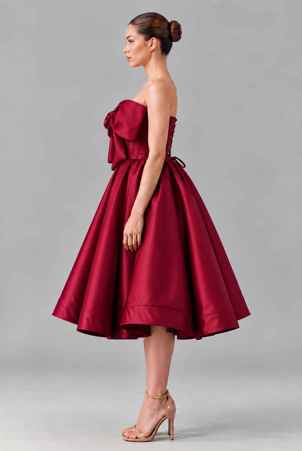 Virtual model wearing The Scarlett Bow Satin Dress Strapless Statement-Bow Satin Gown in Wine