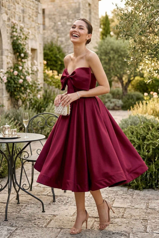 Virtual model wearing The Scarlett Bow Satin Dress Strapless Statement-Bow Satin Gown in Wine